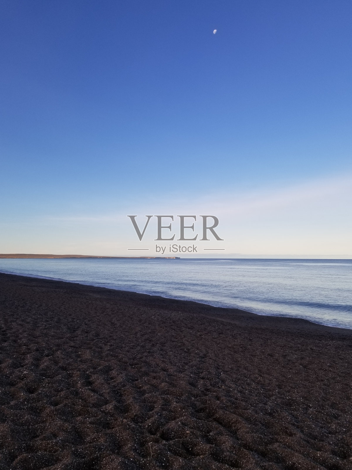 阿根廷马德琳港日落时的海滩照片摄影图片