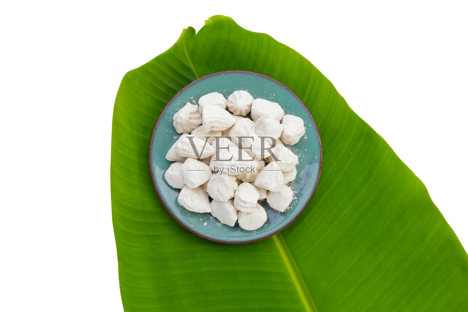 白色粘土填料，软制粉笔。泰国的传统节日，宋干节照片摄影图片