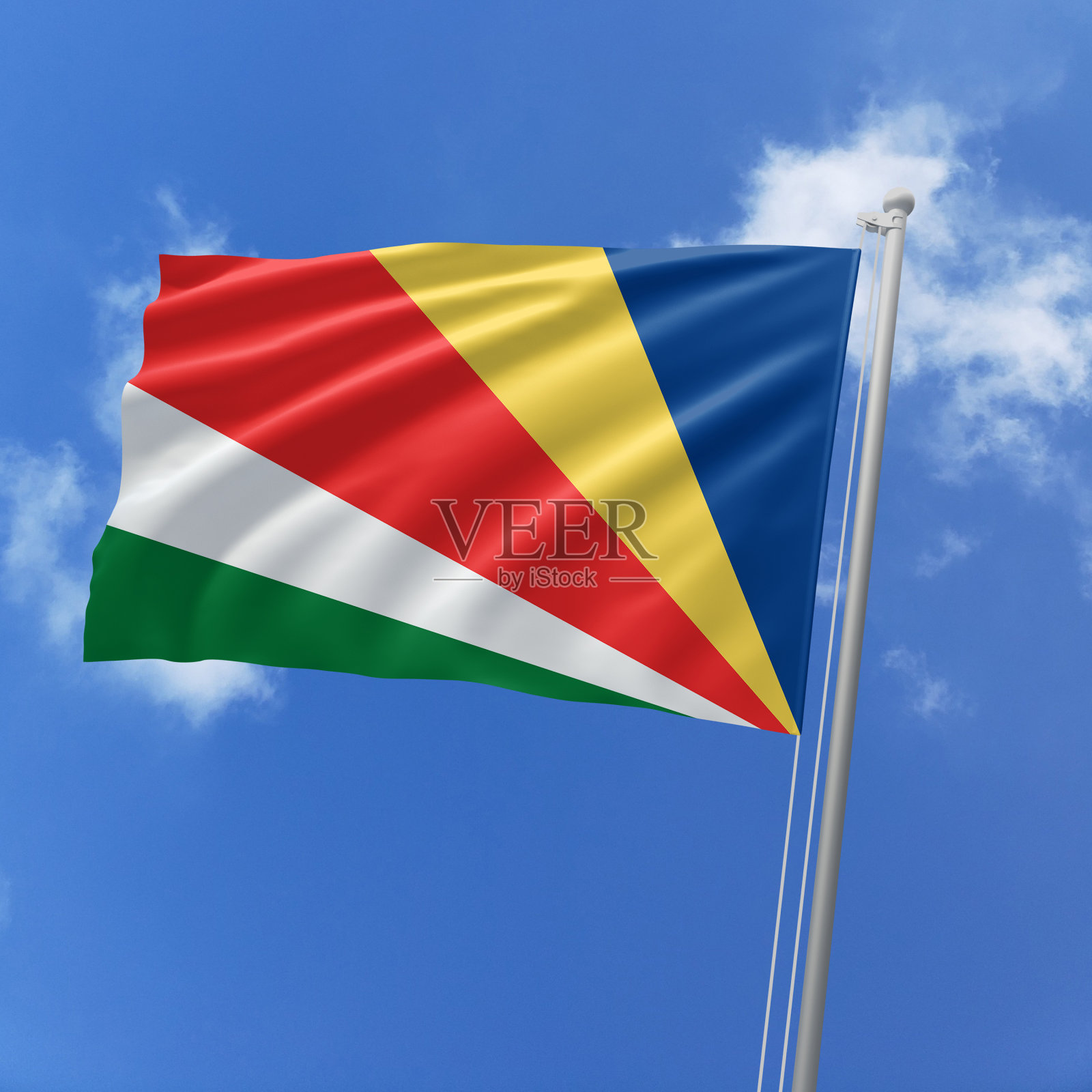 塞舌尔国旗迎风飘扬在天空。照片摄影图片