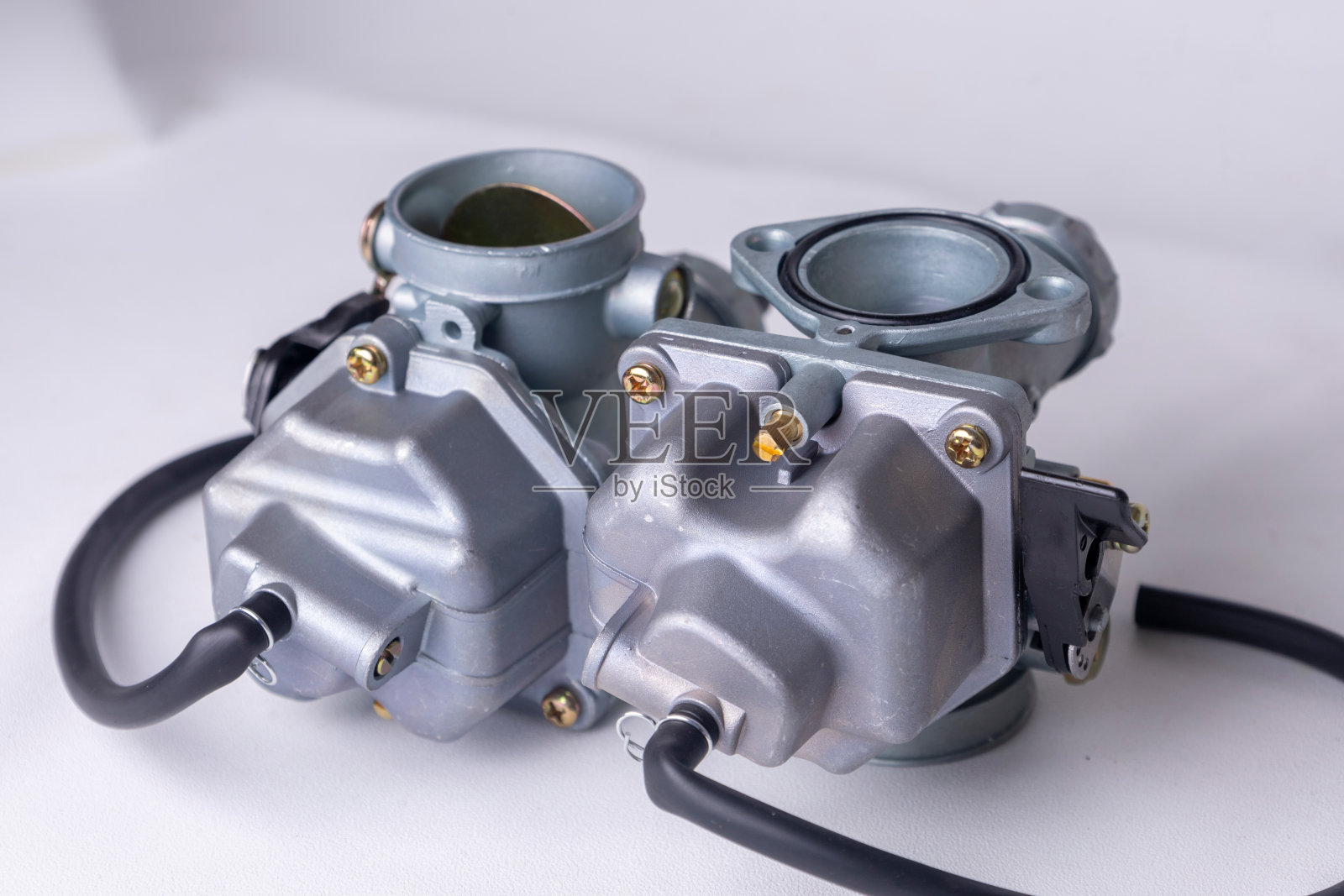 新摩托车化油器隔离在白色照片摄影图片