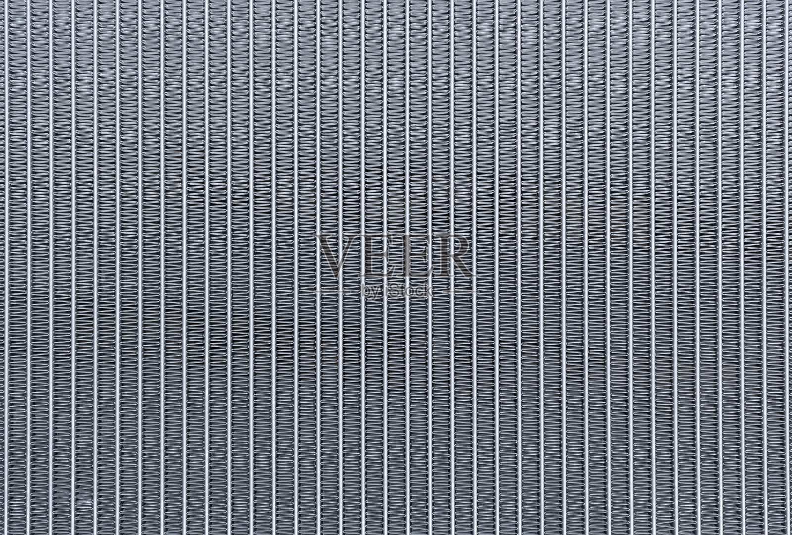 汽车散热器散热器特写，新型汽车蒸发器核心。照片摄影图片