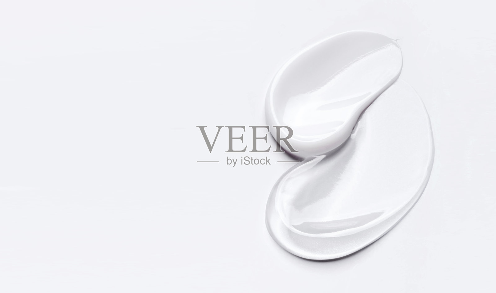 在浅色背景上涂抹霜和凝胶纹理的化妆品护理产品样品照片摄影图片