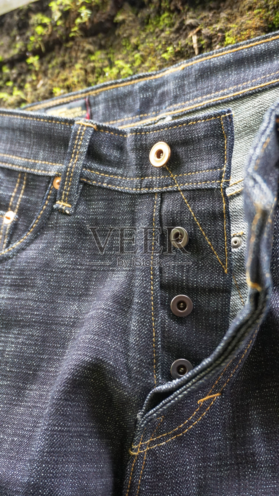 拉链扣牛仔裤照片摄影图片