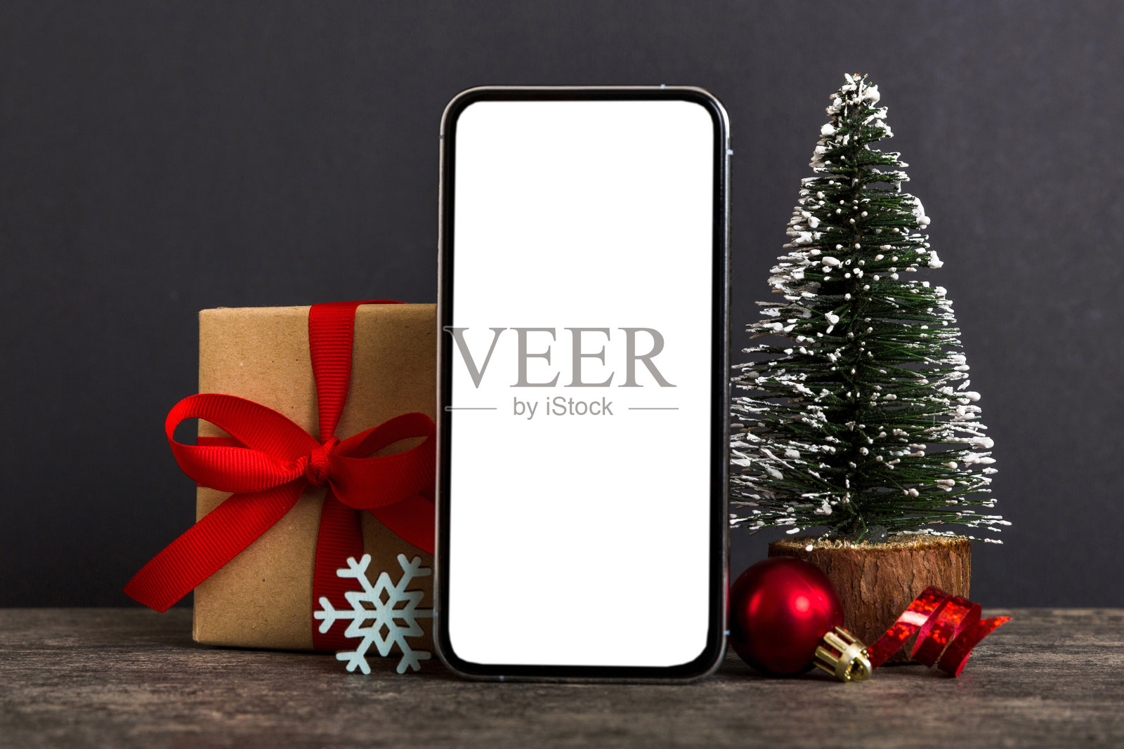 圣诞装饰手机样机，用于APP展示照片摄影图片