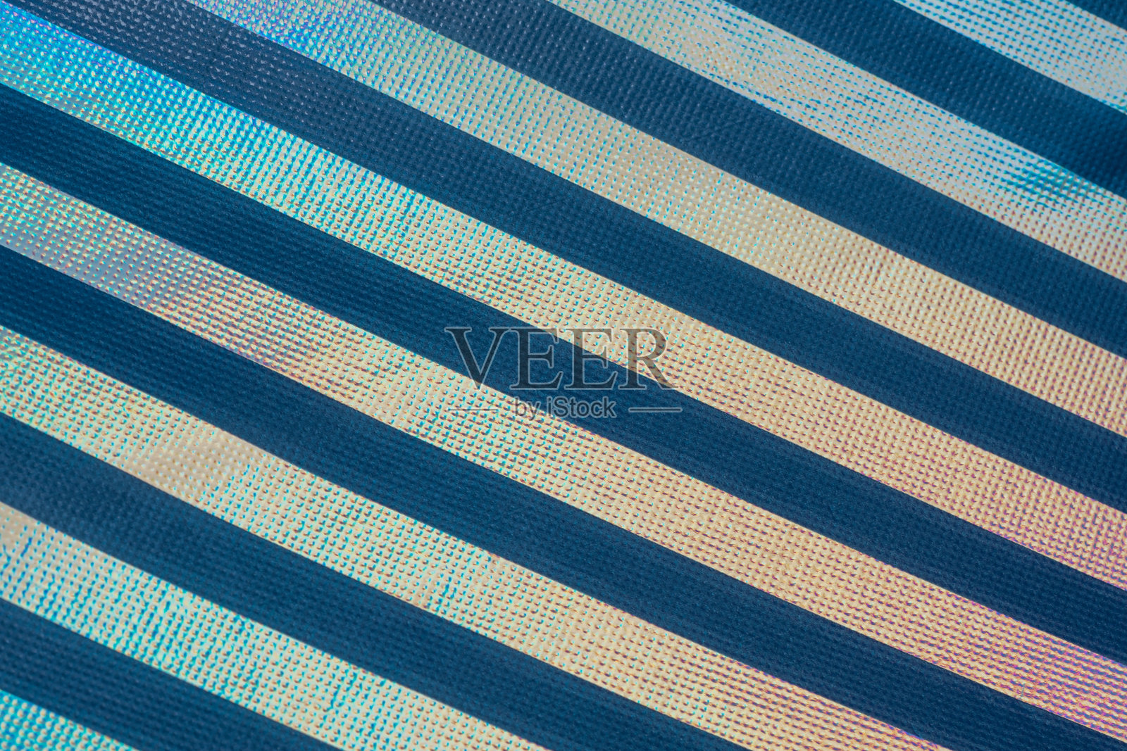 渐变条纹。全息箔纹理。迷幻的背景照片摄影图片