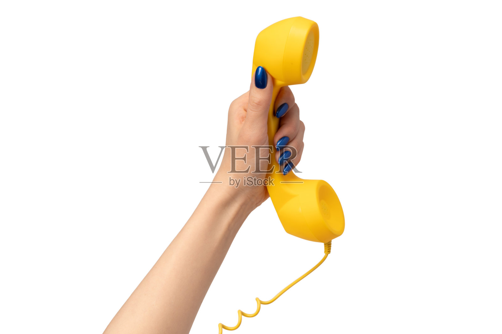 女人手里的黄色手机孤立在白色上。副本的空间。照片摄影图片