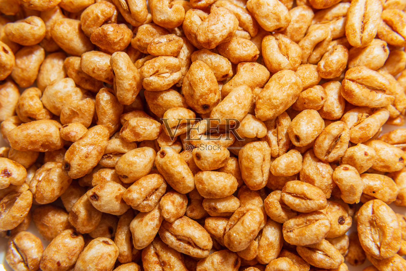 焦糖小麦干谷物早餐微距特写背景。照片摄影图片