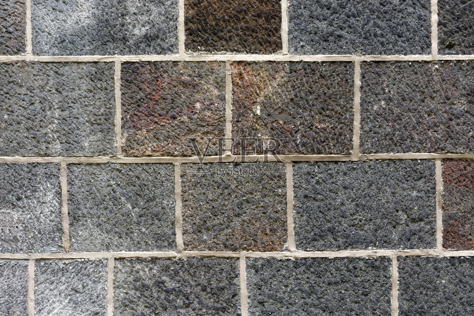 石墙的残片。照片摄影图片