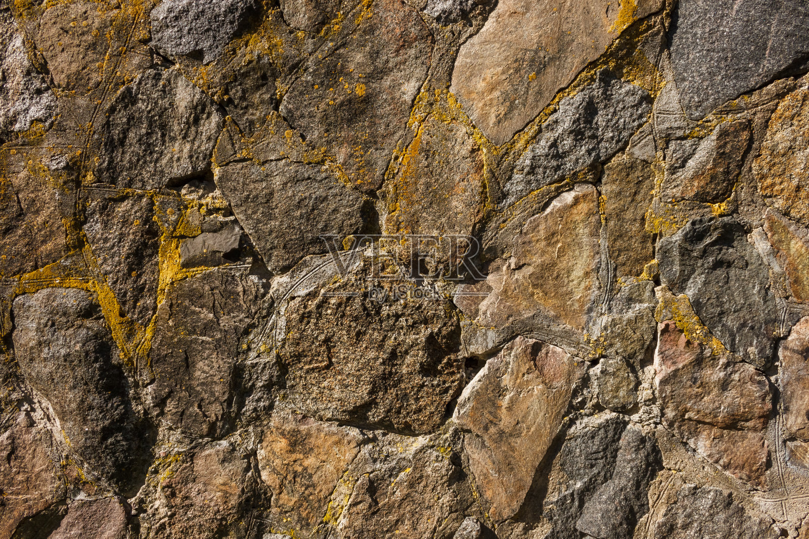 这堵老墙是用石头砌成的照片摄影图片