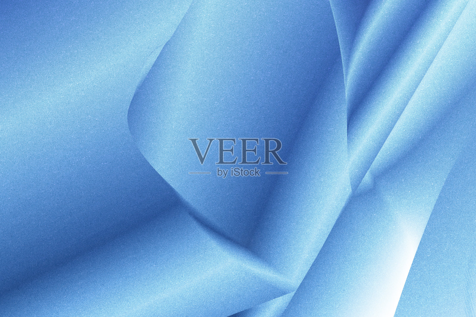 抽象的蓝白色闪光纸。自然纹理背景。波模式。复古风格的概念。照片摄影图片