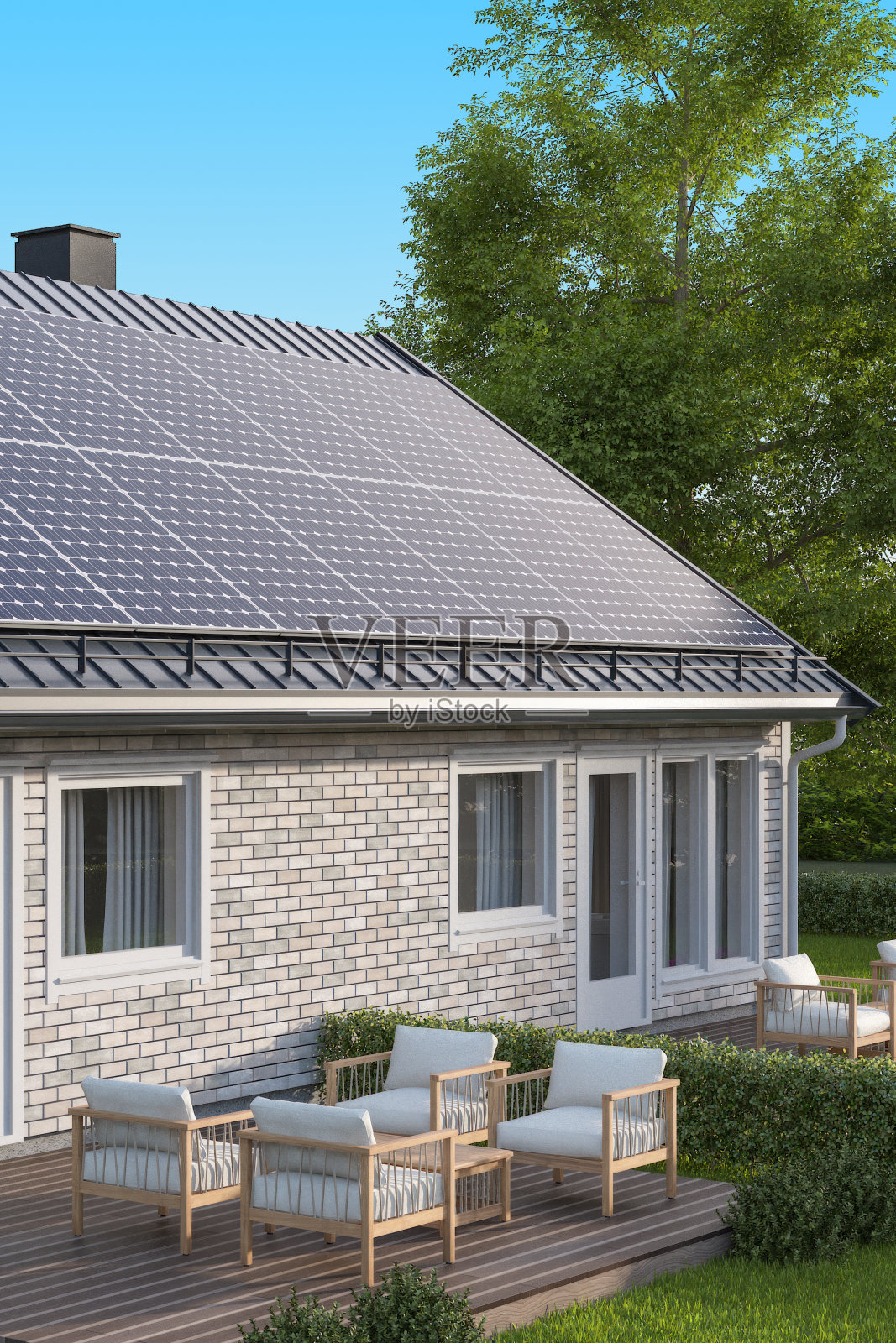 现代白砖房灰色金属屋顶上的太阳能电池板照片摄影图片