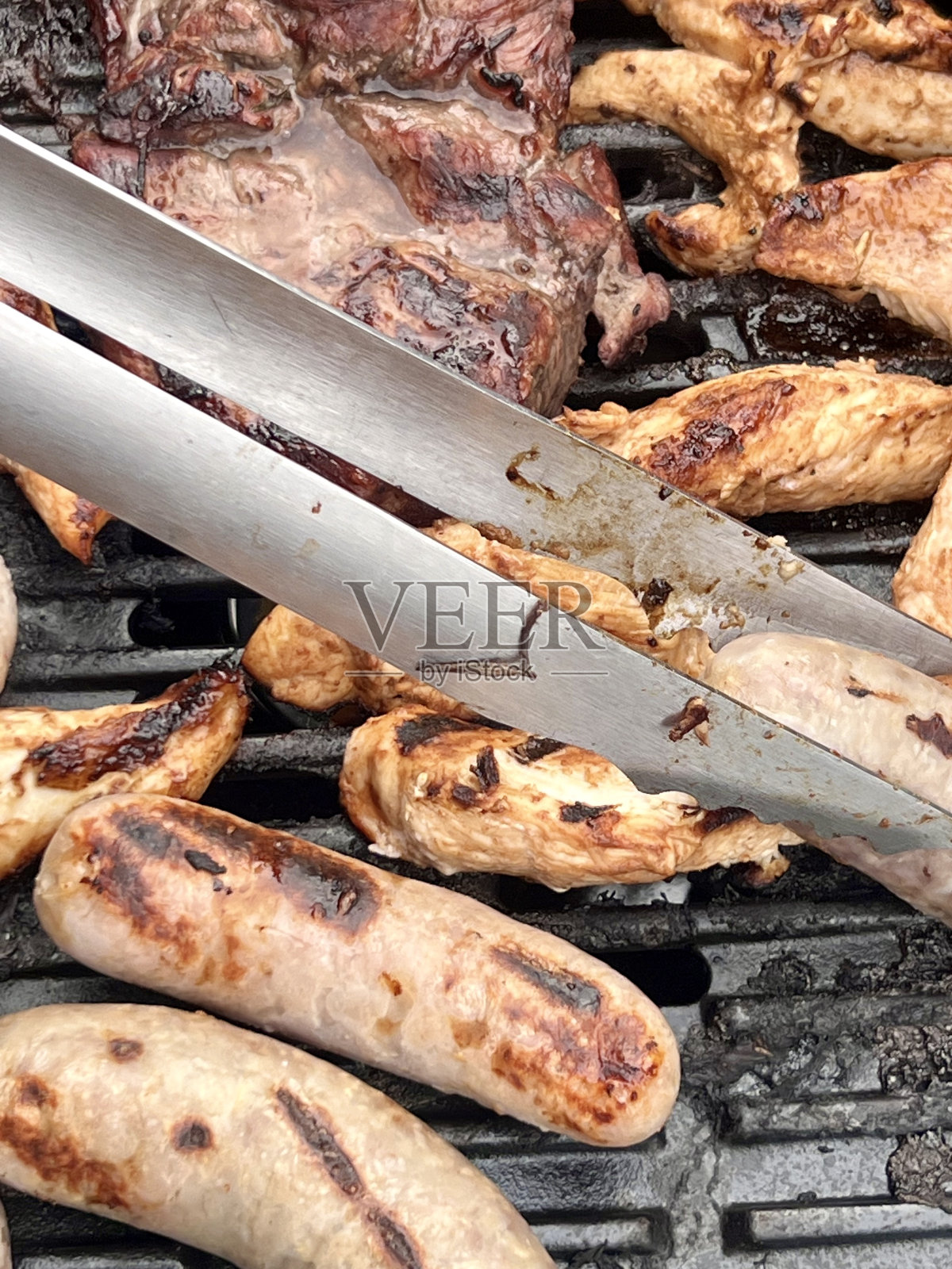 在烧烤上烹饪照片摄影图片