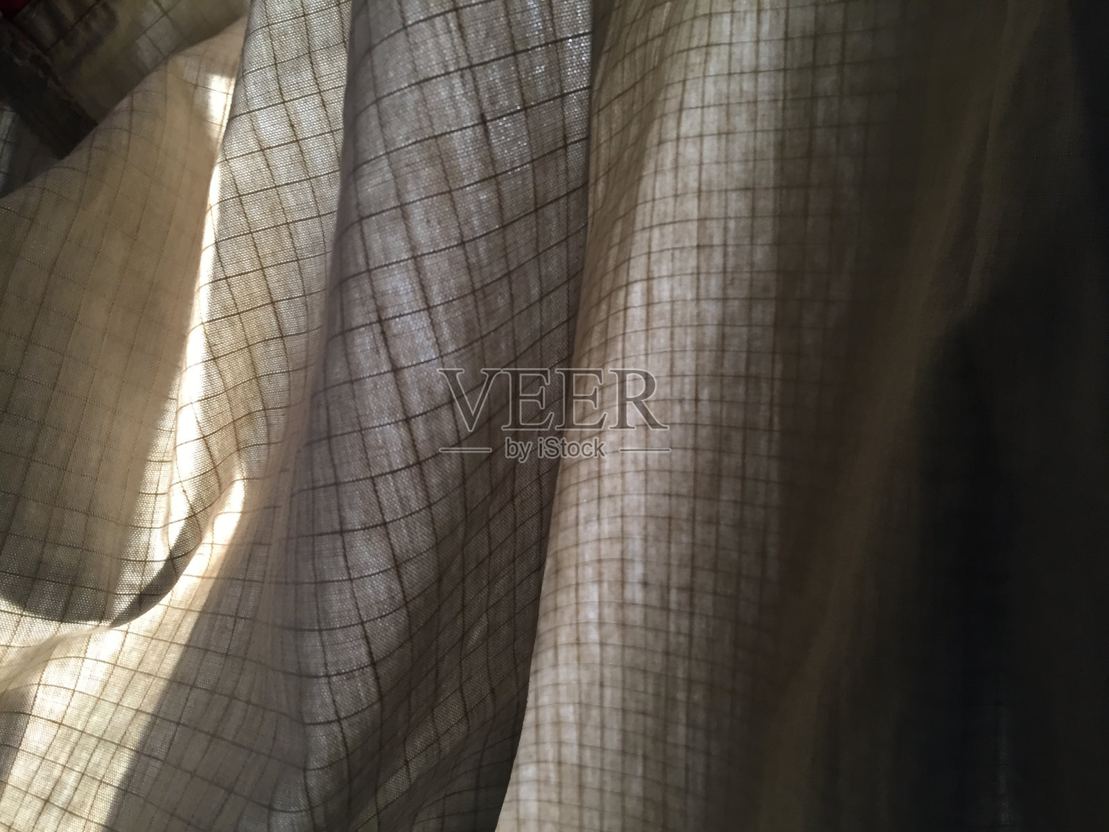 曲线格纹夹克内部的特写照片照片摄影图片