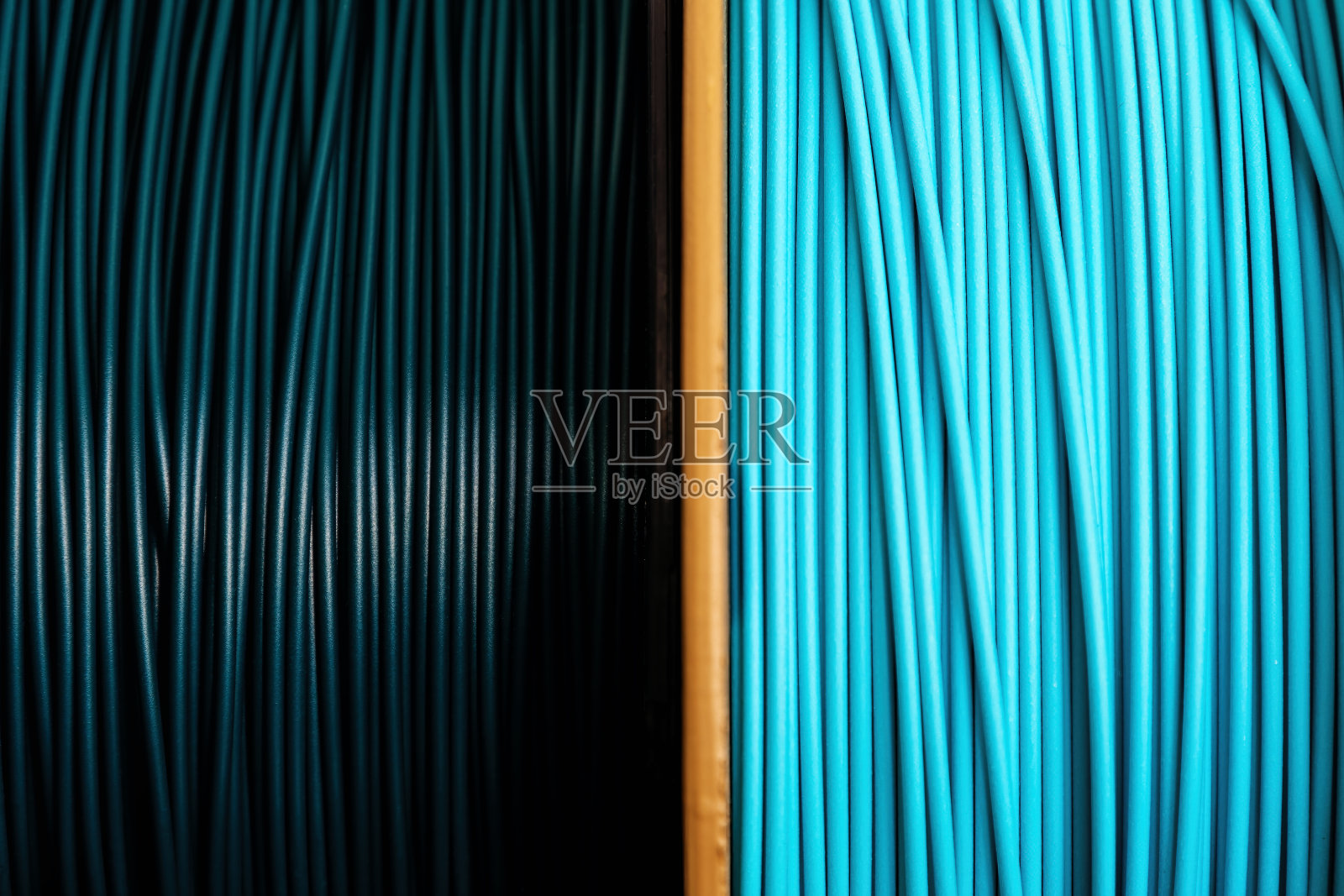 3D打印机线材卷轴背景，蓝色、绿色和青色照片摄影图片