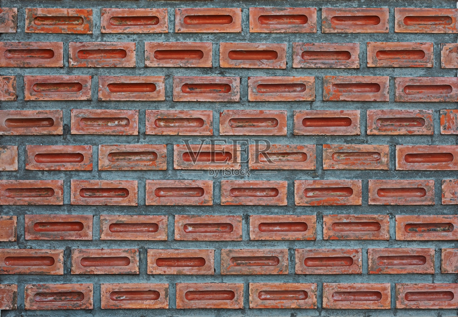 一个漂亮的红砖墙适合用作背景。照片摄影图片