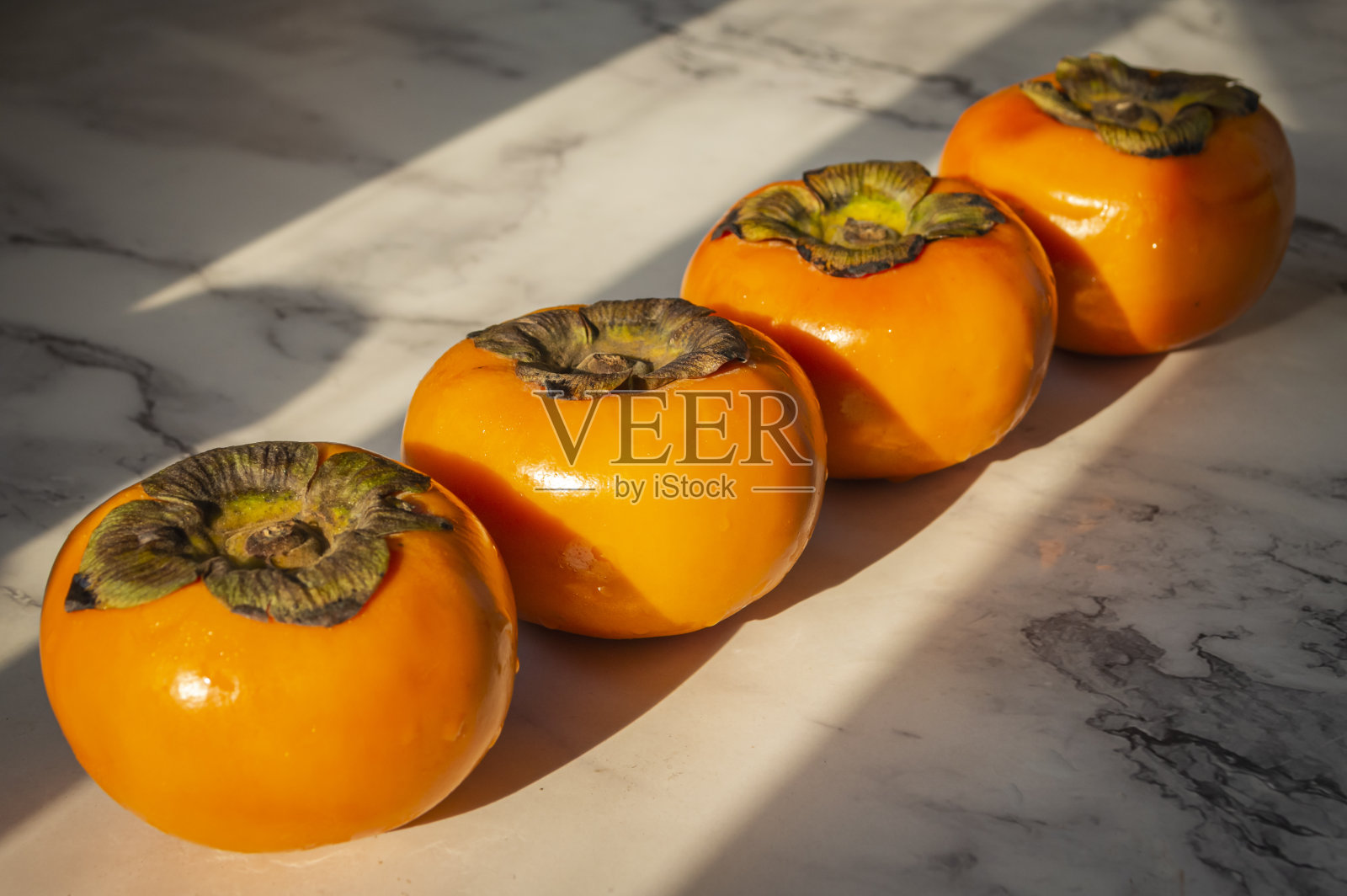 亮黄色的柿子照片摄影图片