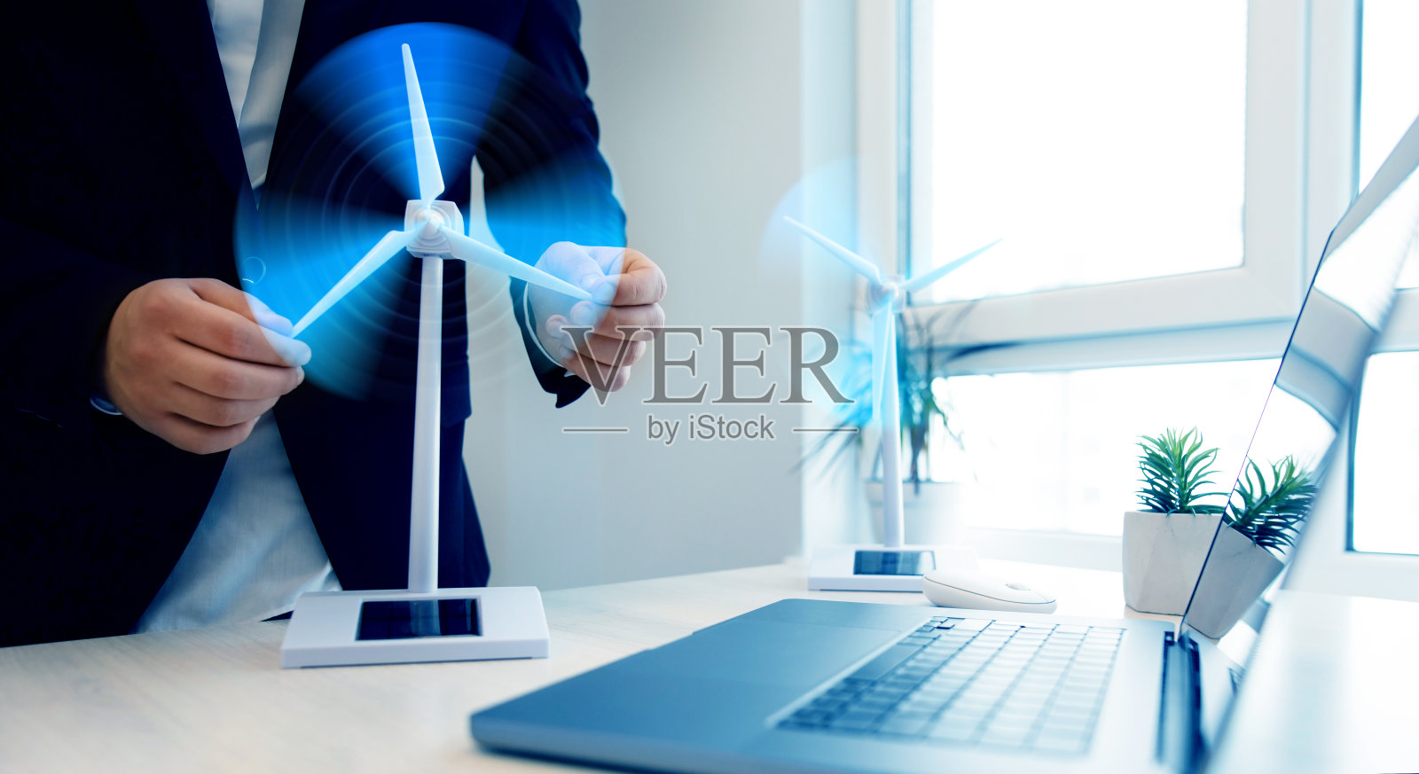 负责风力发电园区项目设计。产生绿色能源的气流的风车图解。照片摄影图片