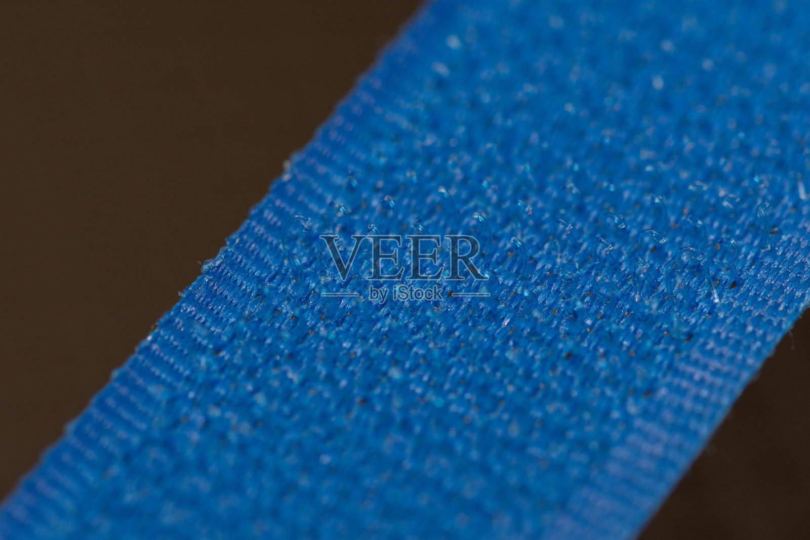 蓝色魔术贴丝绒照片摄影图片