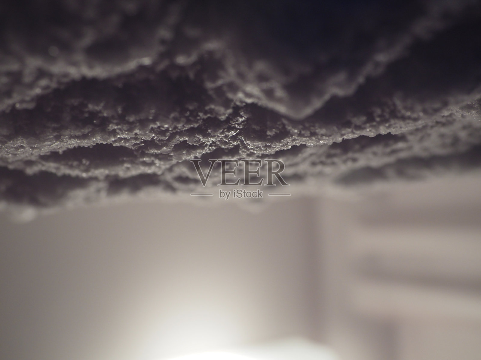 冰箱上结了冰。照片摄影图片