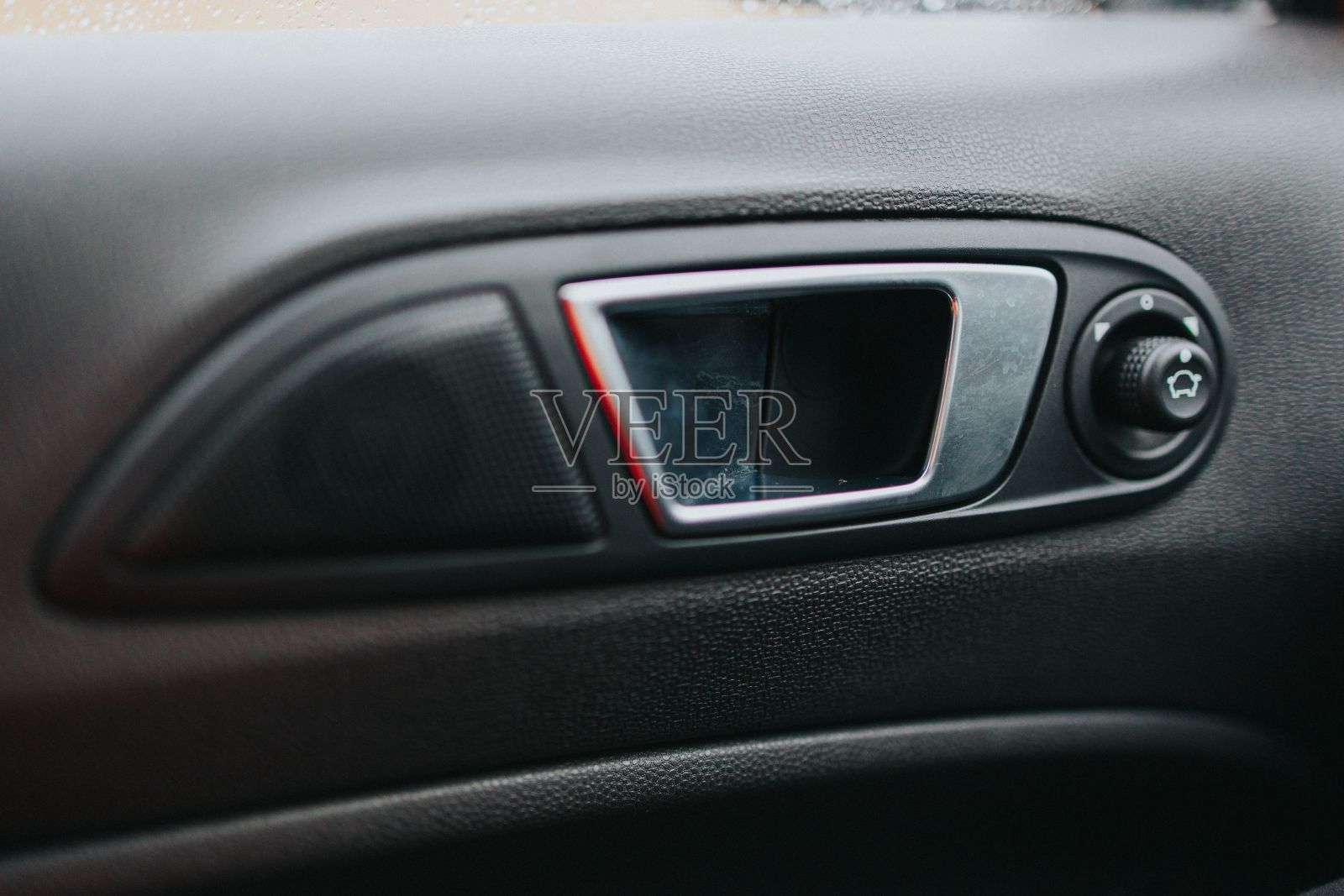 车内车门把手的特写镜头照片摄影图片