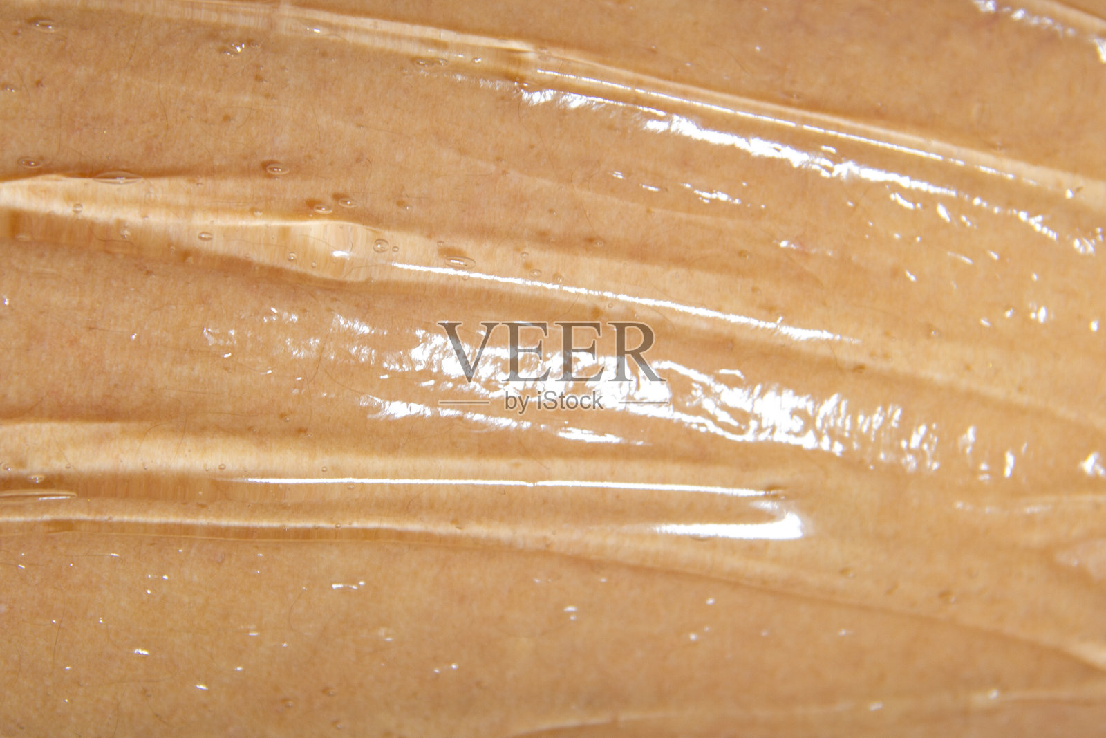 涂在皮肤上的透明化妆品或医用凝胶照片摄影图片