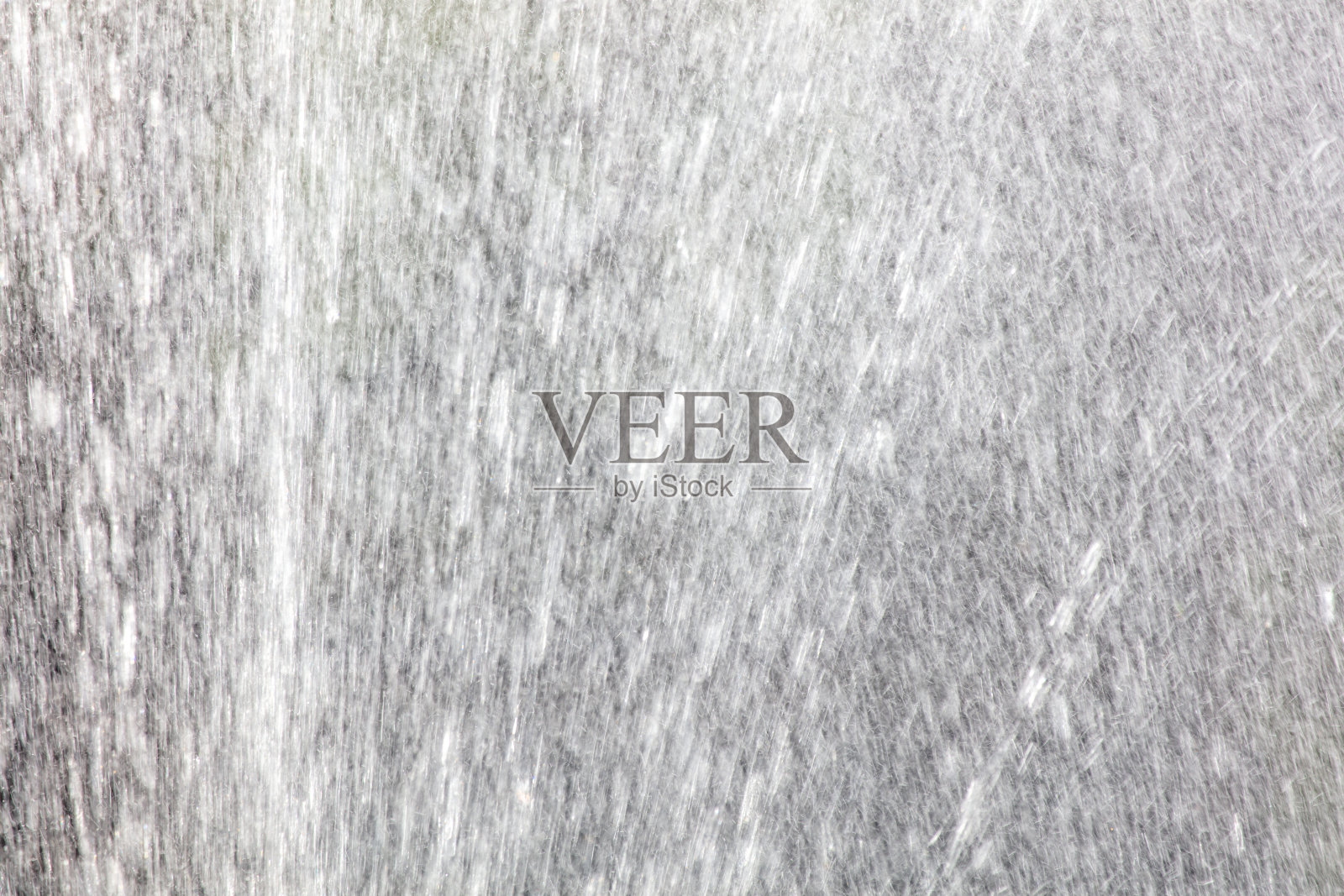 雨水飞溅作为抽象背景。纹理照片摄影图片