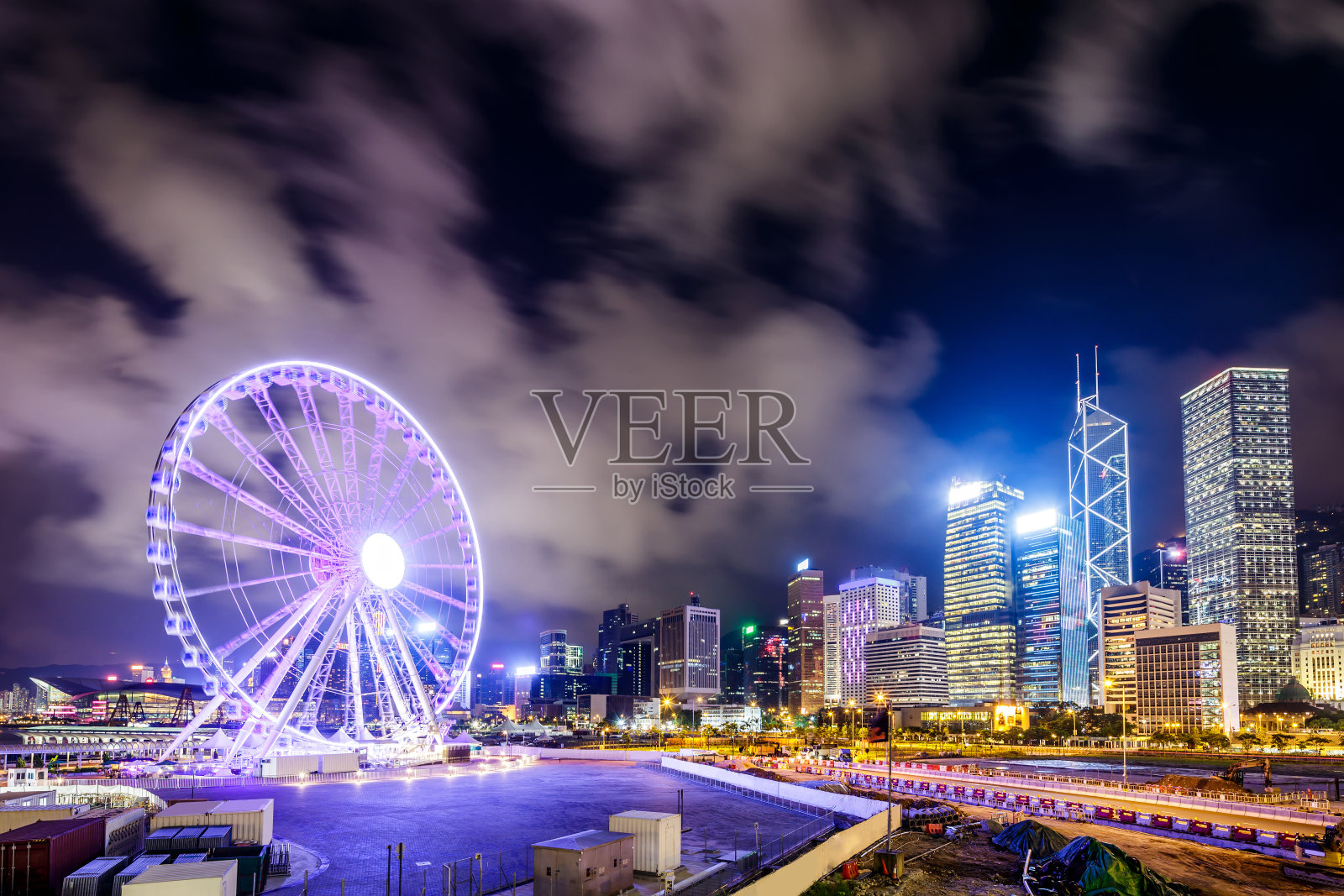 摩天轮和现代都市夜景照片摄影图片