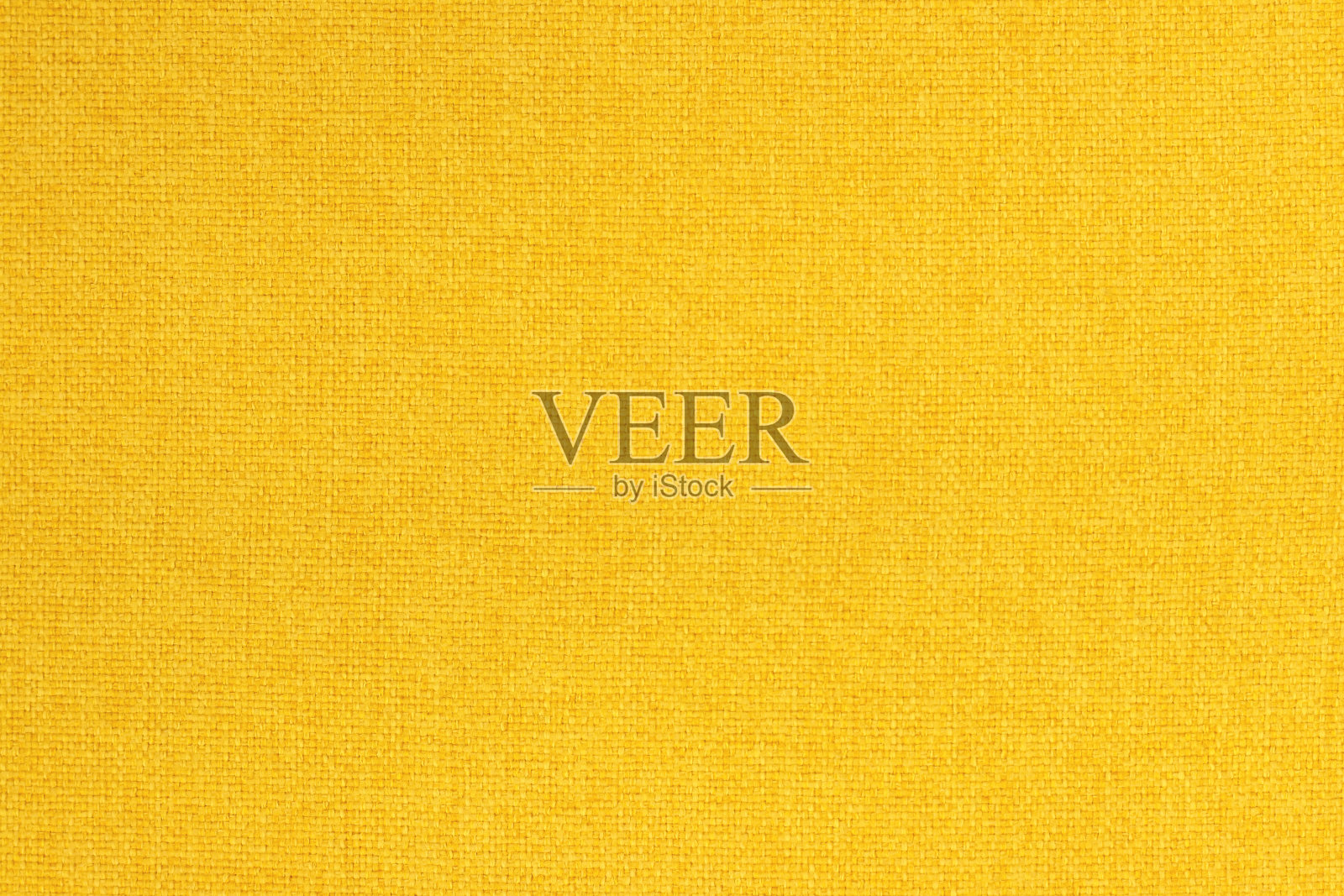 金黄的纯棉面料纹理背景，天然纺织品的无缝花纹。照片摄影图片