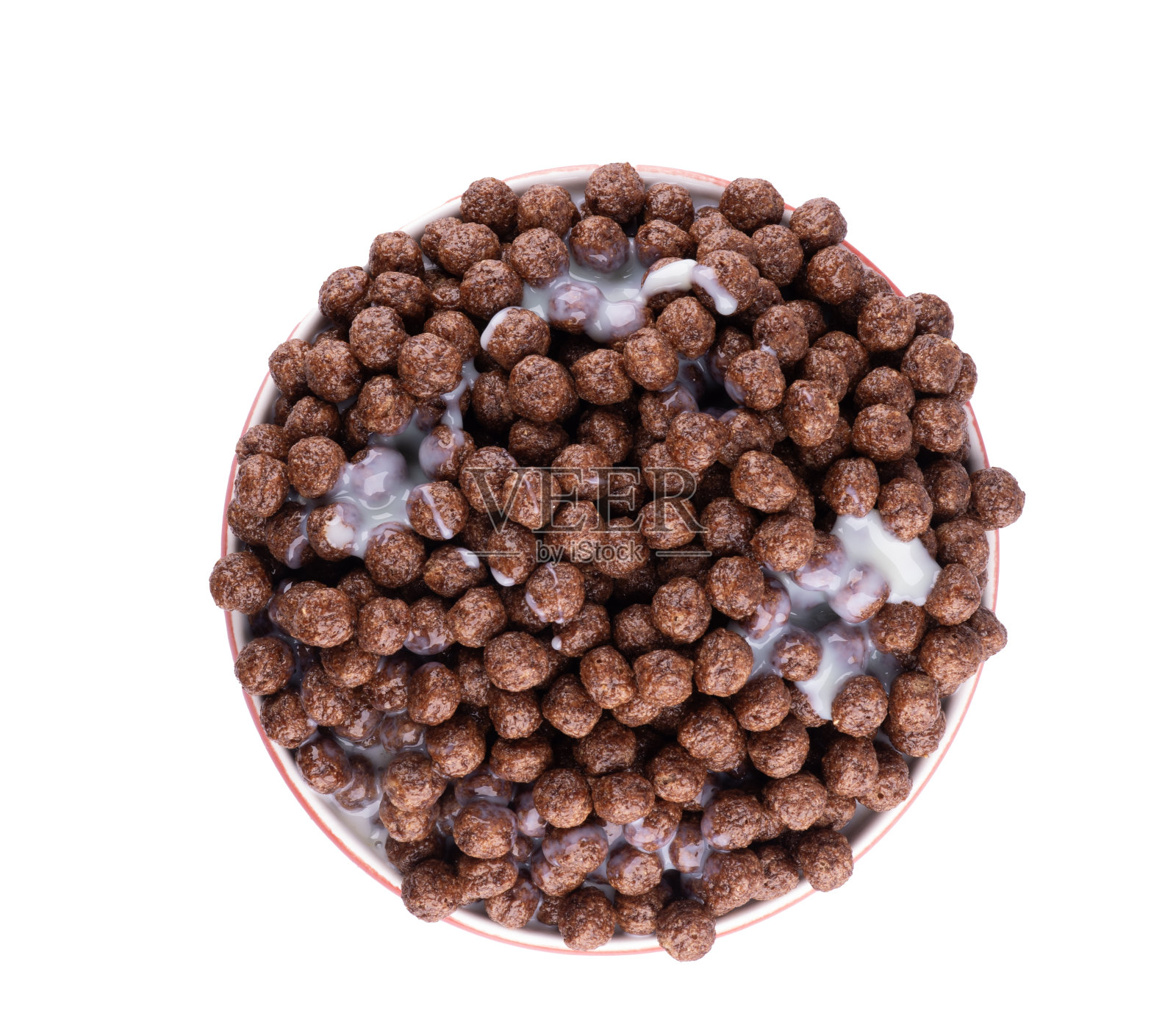 早餐麦片碗装满巧克力球的味道与糖和牛奶俯视图照片摄影图片