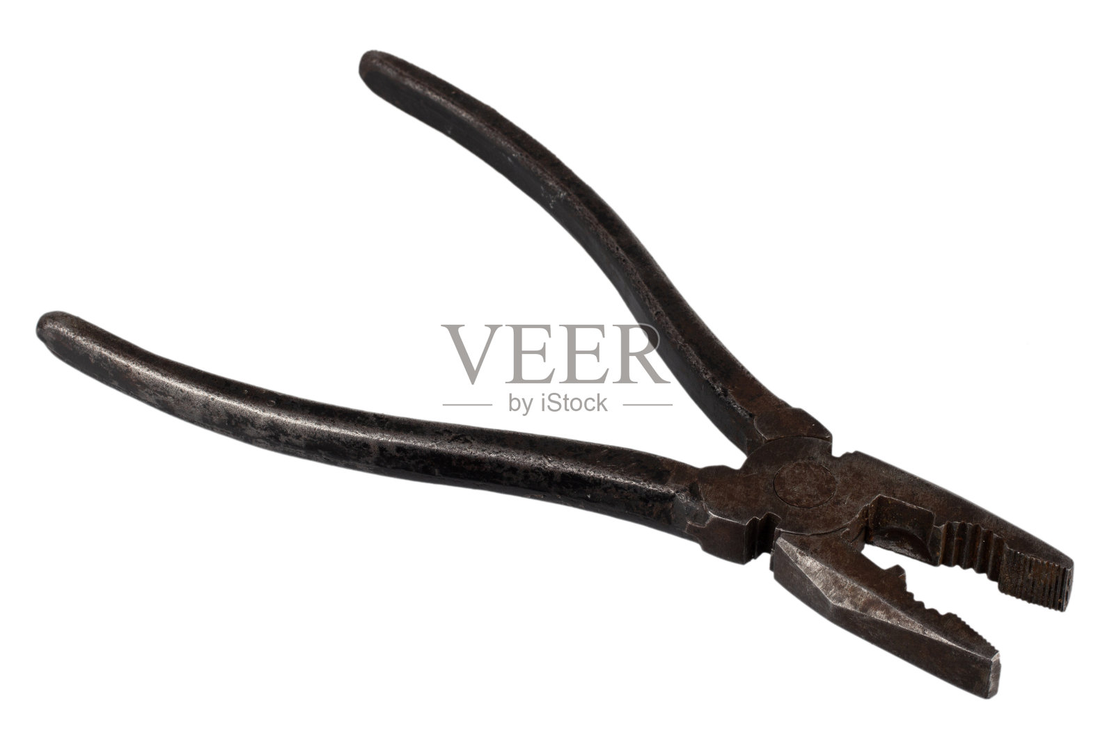 古董复古生锈的钢丝钳，或组合钳或线匠的钳子。照片摄影图片