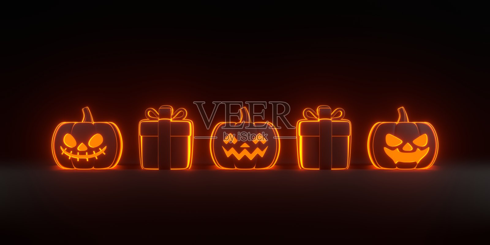 黑色背景上有霓虹灯的卡通礼品盒和万圣节南瓜照片摄影图片