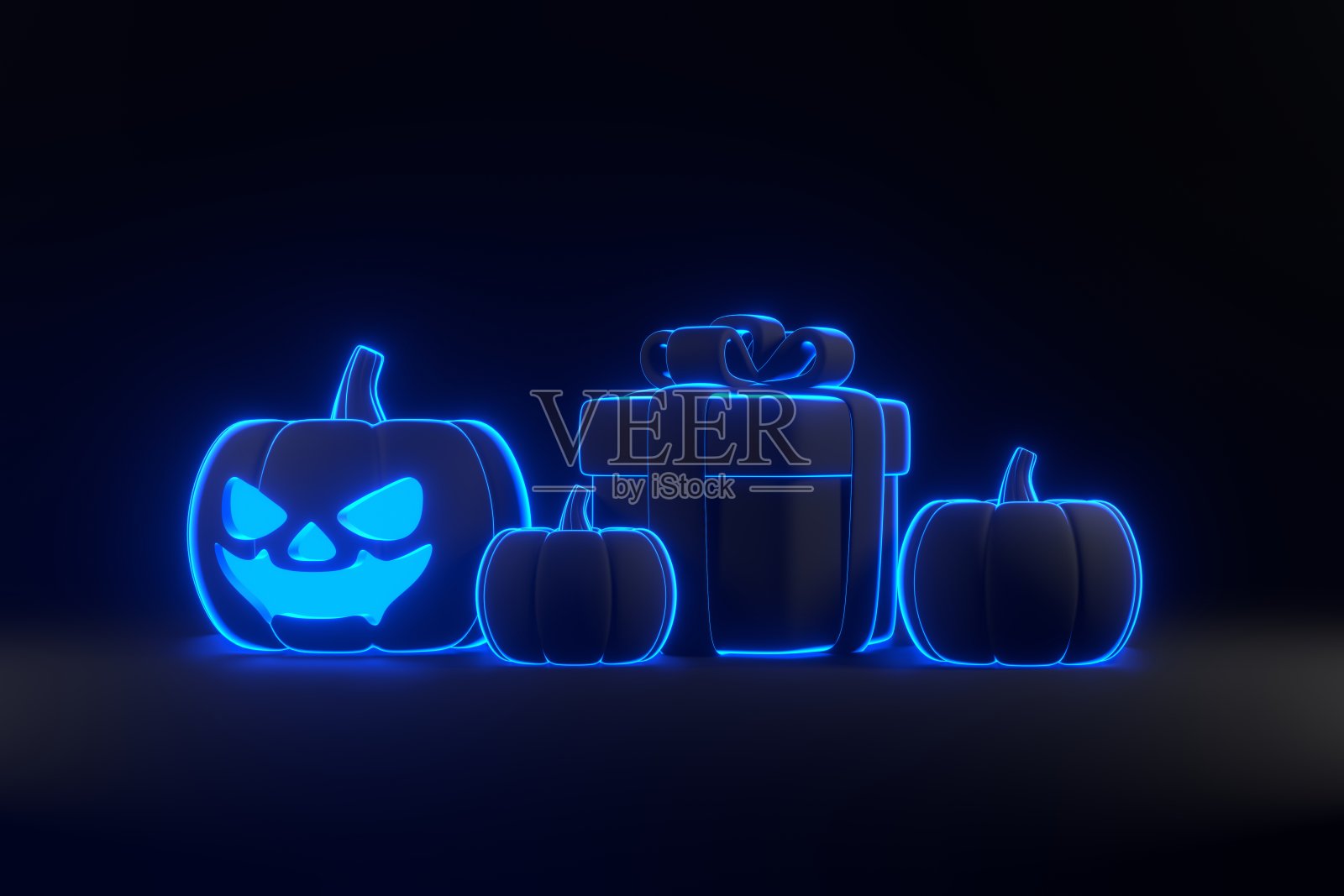 黑色背景上有霓虹灯的万圣节南瓜卡通礼盒照片摄影图片