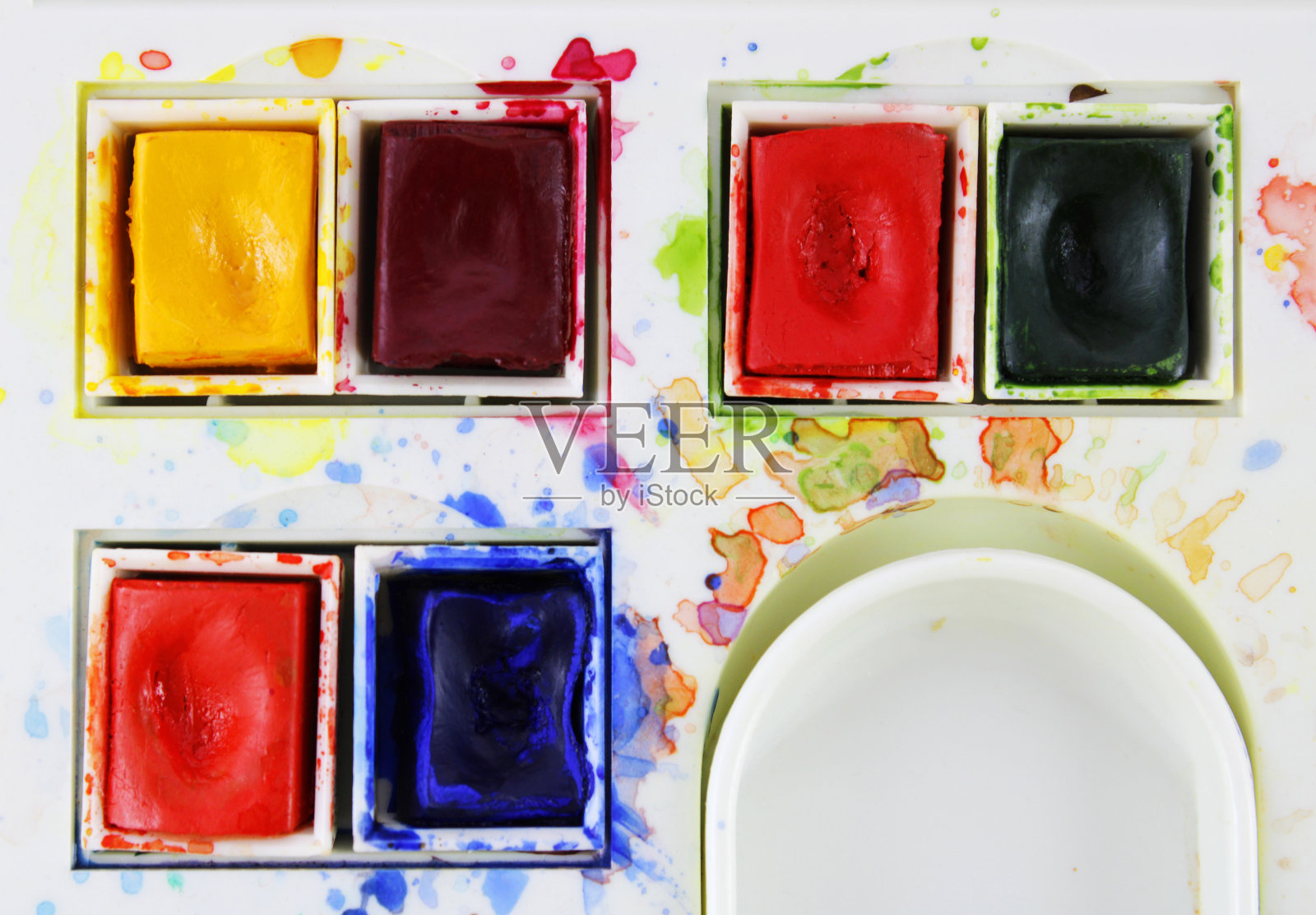 用不同颜色飞溅的水彩片照片摄影图片