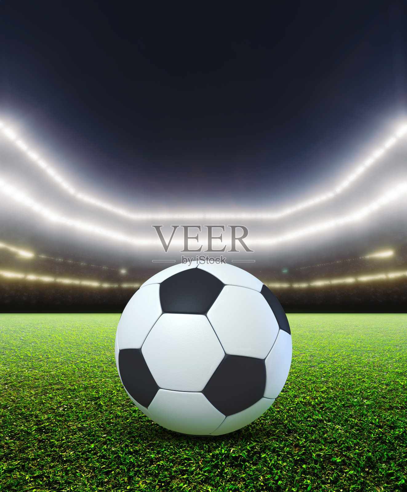 泛光灯照亮的足球之夜照片摄影图片