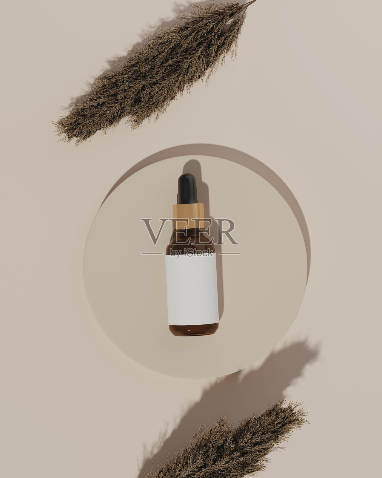 俯视图一个滴管玻璃瓶，并把圆柱体在米色背景照片摄影图片