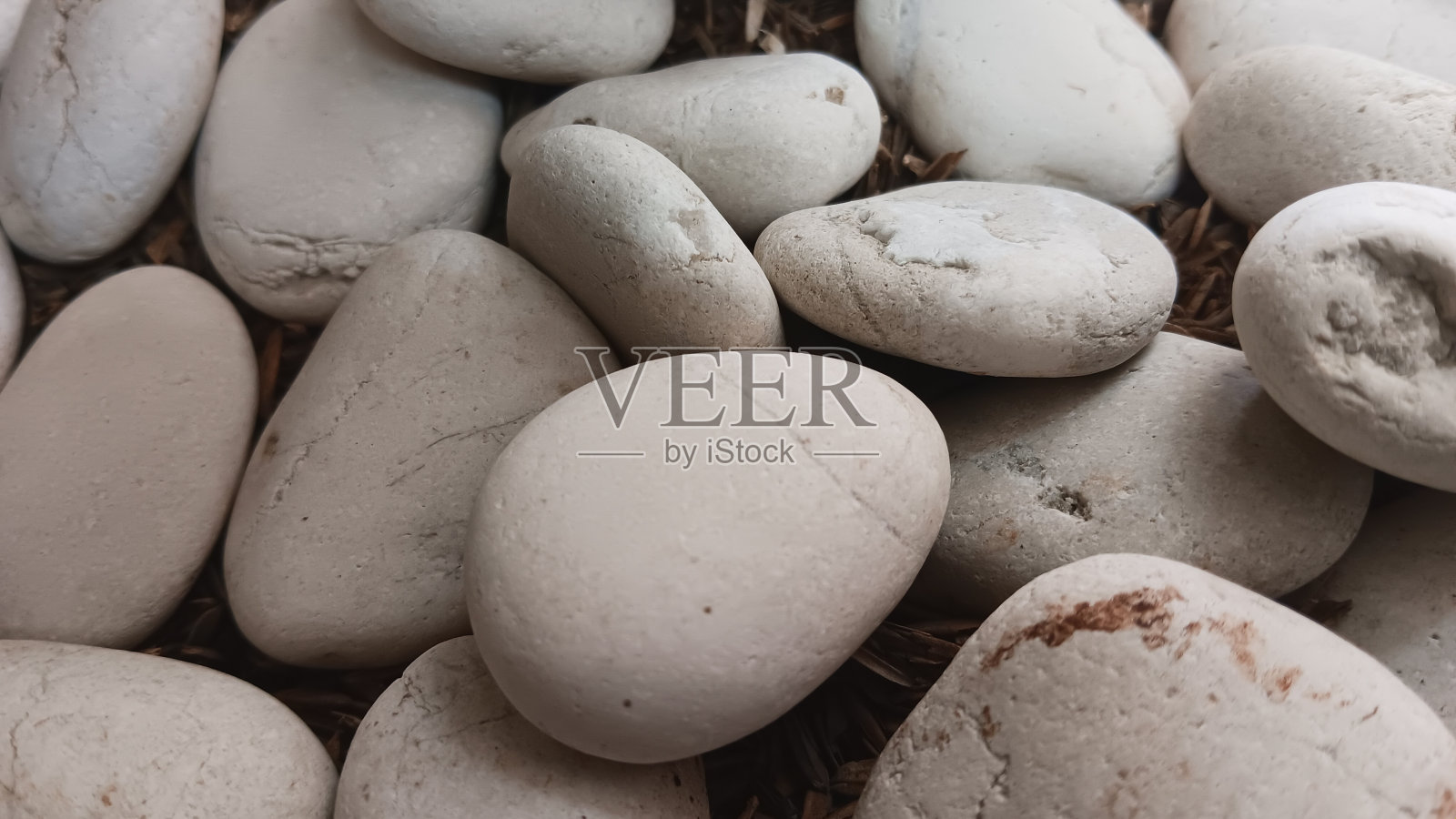 堆叠白色砾石作为背景照片摄影图片