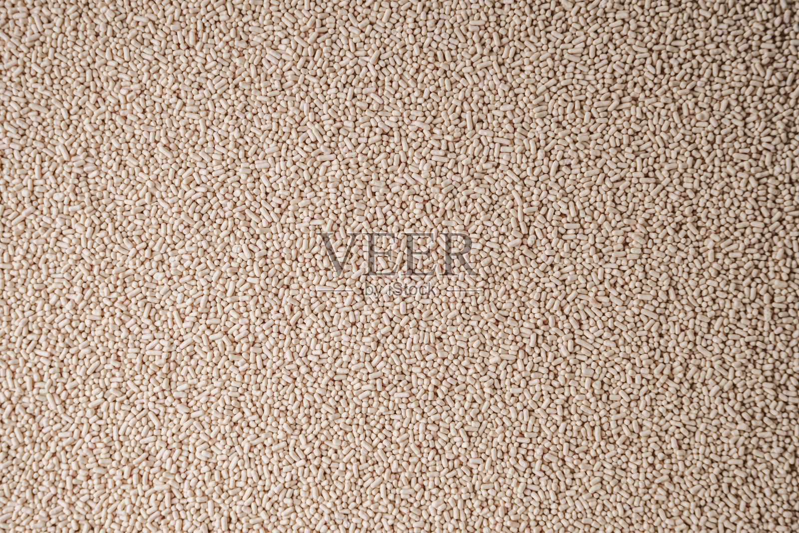 白色背景的粒状干酵母照片摄影图片