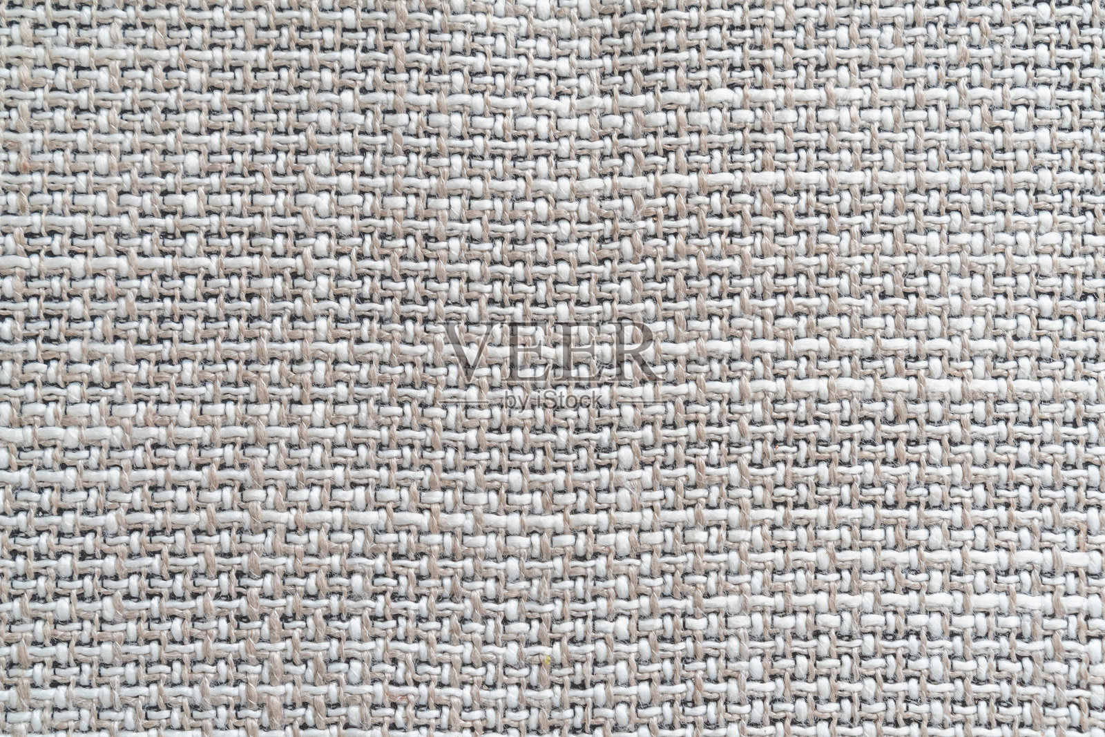 黑麻麻袋布以黄麻麻布织成的棉织物为织物纹理图案，底色为棕褐色，呈陈年色照片摄影图片