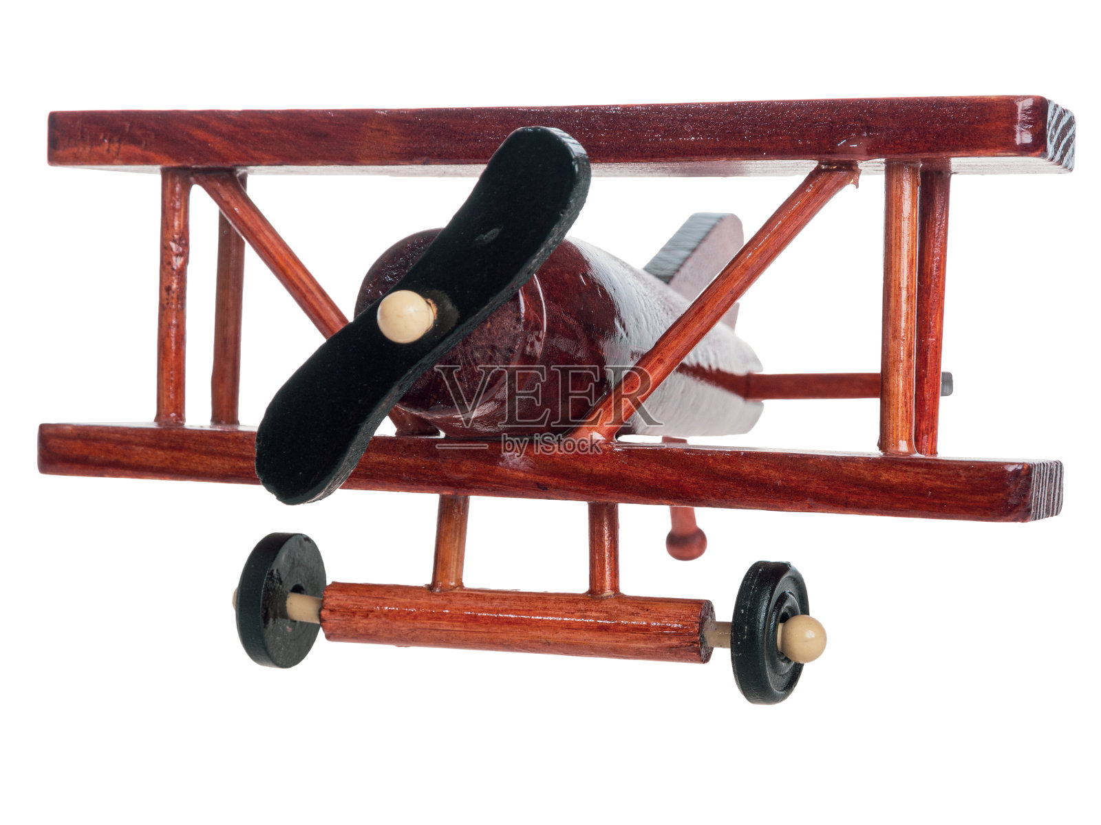 木制玩具飞机的儿童游戏，复古复古的风格，孤立的白色背景照片摄影图片