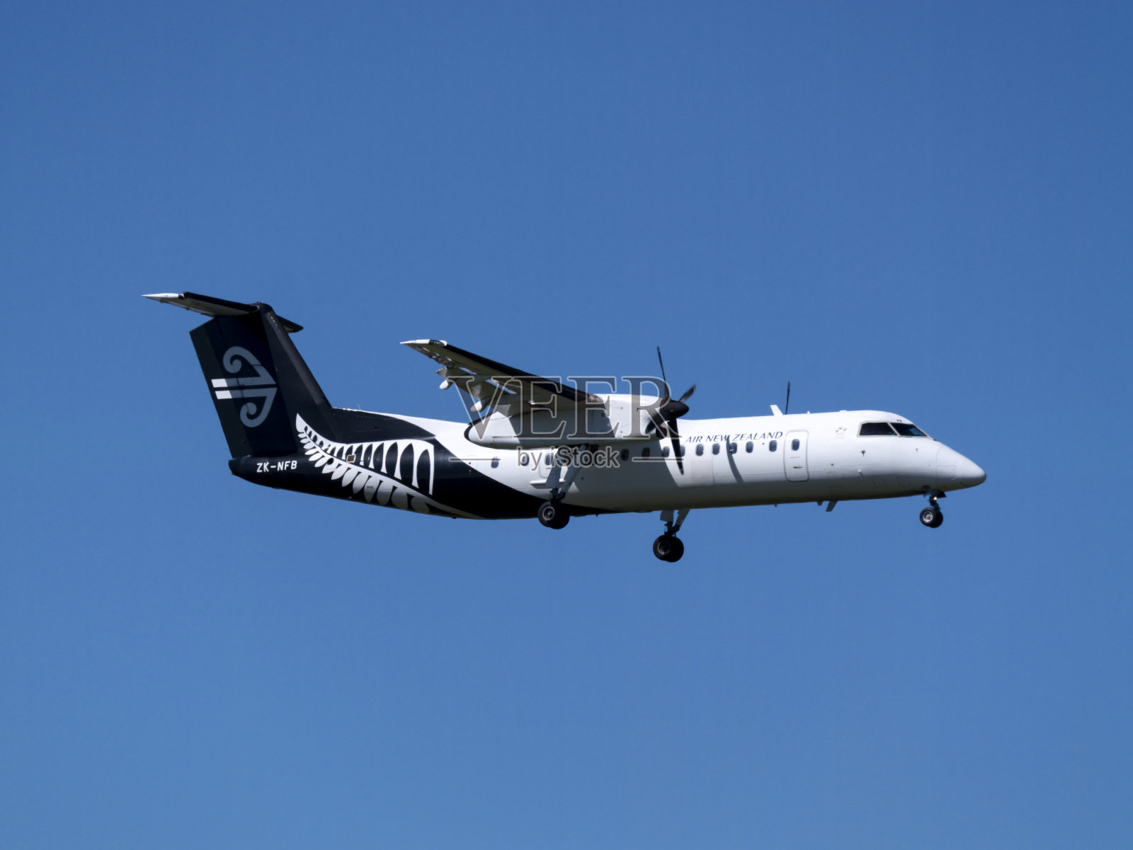 新西兰德哈维兰航空公司加拿大Dash 8-300在新西兰奥克兰的奥克兰国际机场照片摄影图片