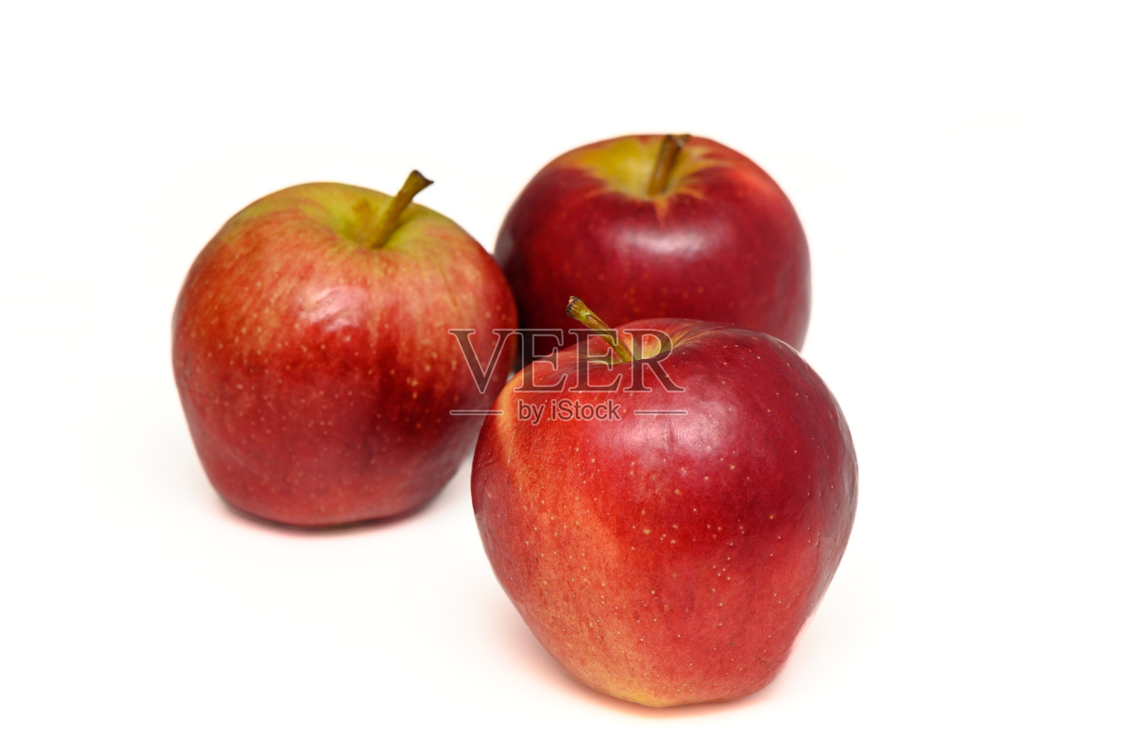 白色背景上新鲜可口的苹果照片摄影图片