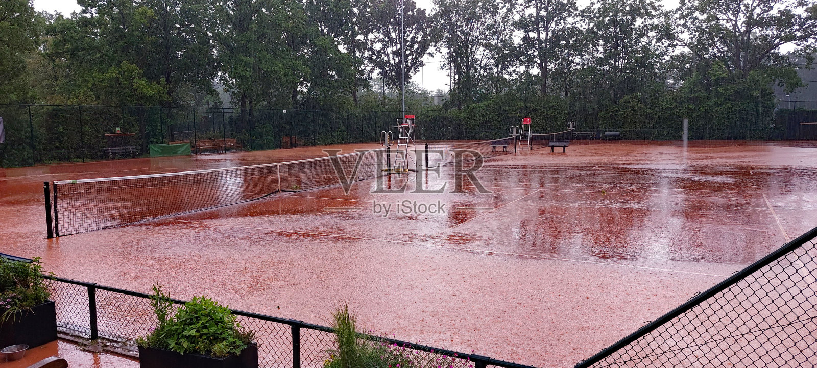 网球因雨取消照片摄影图片