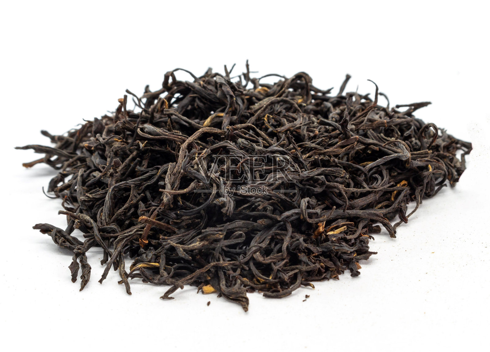 白色背景上的散茶叶照片摄影图片