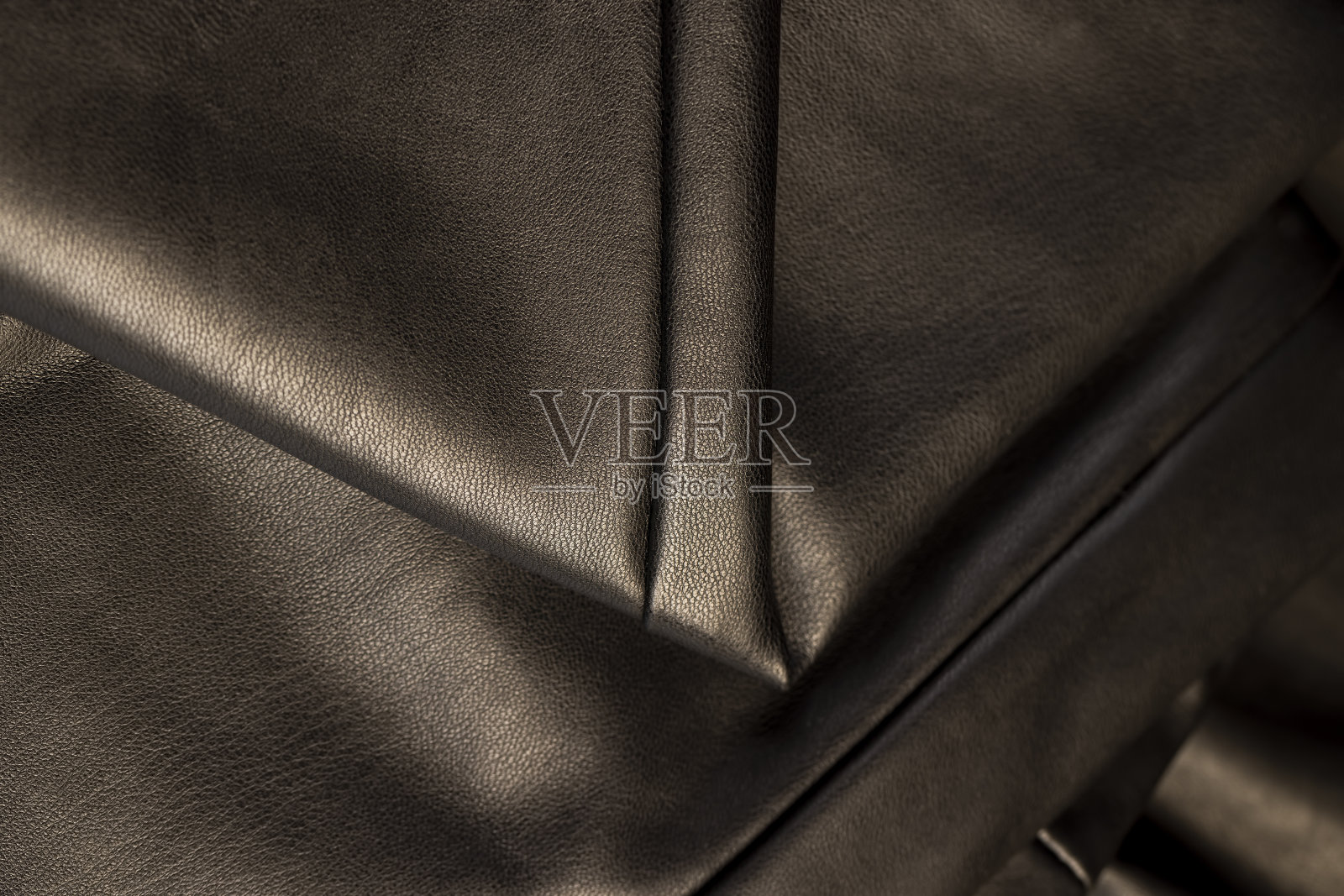 生产服装用的黑色皮革材料照片摄影图片