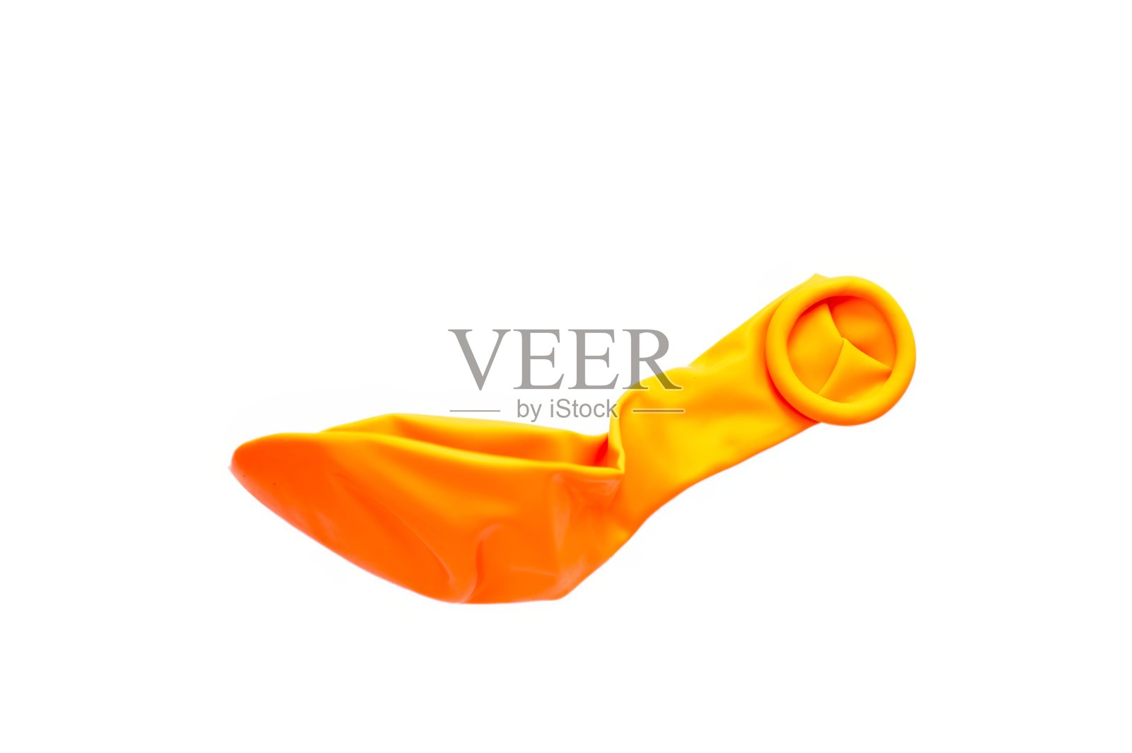 未吹的橙色气球孤立在白色。世界气球日照片摄影图片