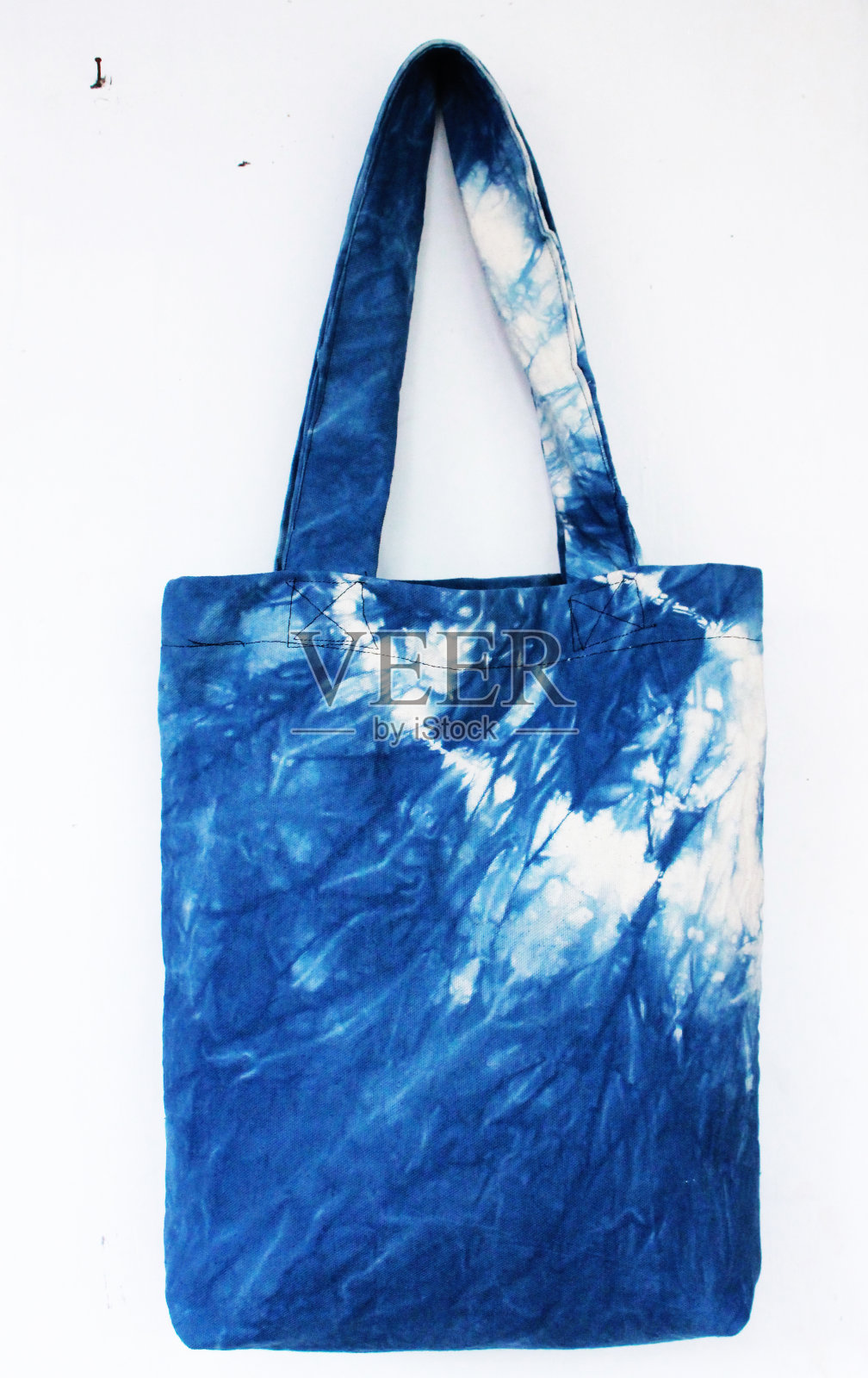 特写漂亮的扎染手提袋，手工制作的手提袋，零浪费照片摄影图片