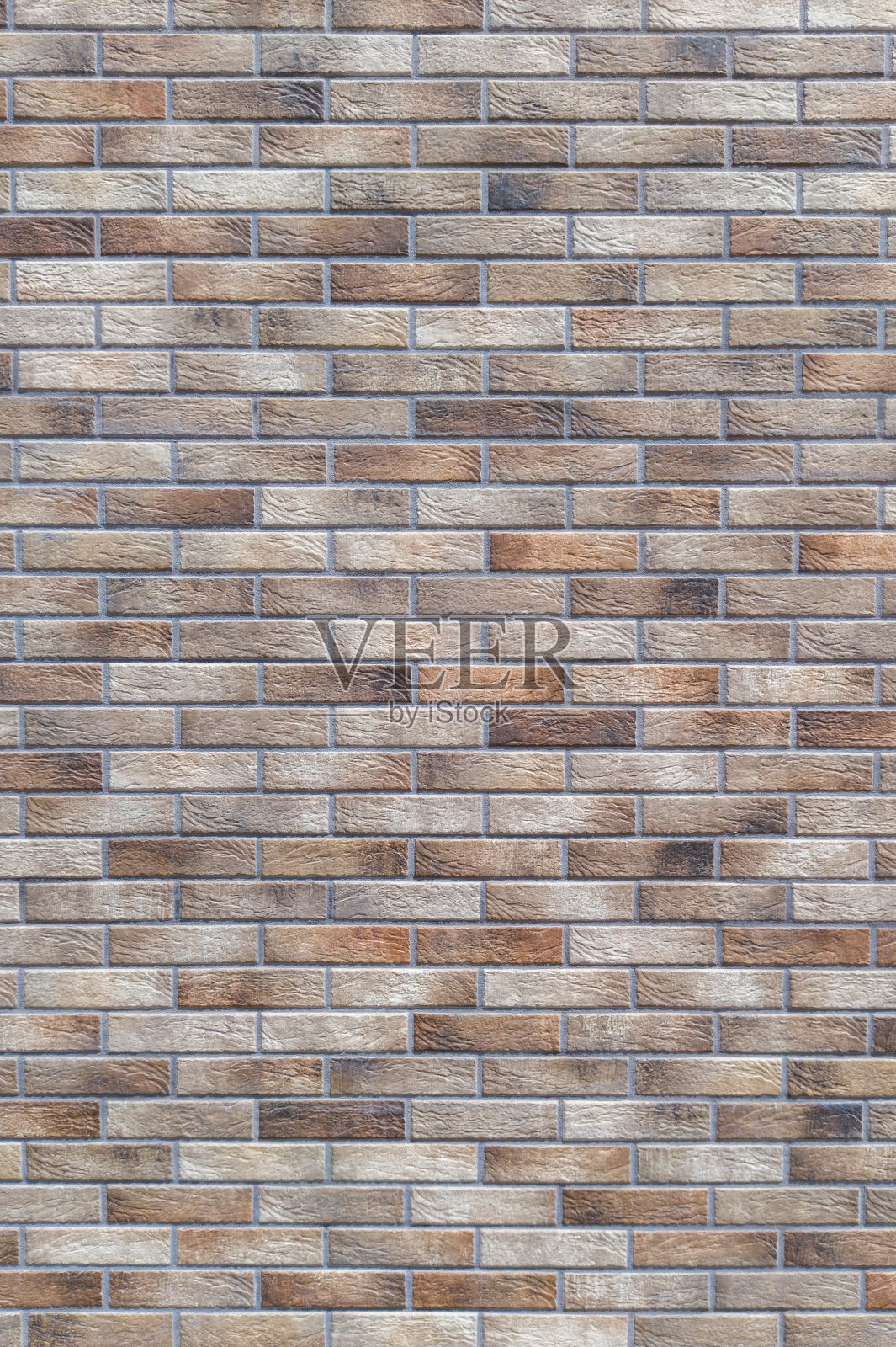 棕色和灰色砖墙背景，垂直拍摄照片摄影图片