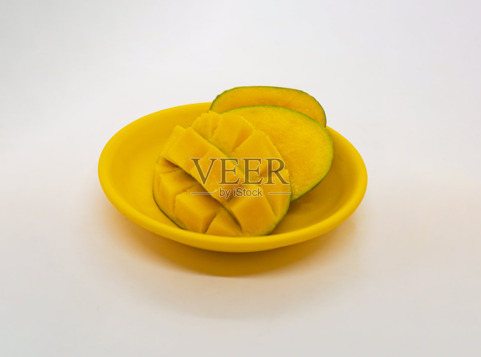 看起来很好吃的绿芒果切片时是黄色的照片摄影图片