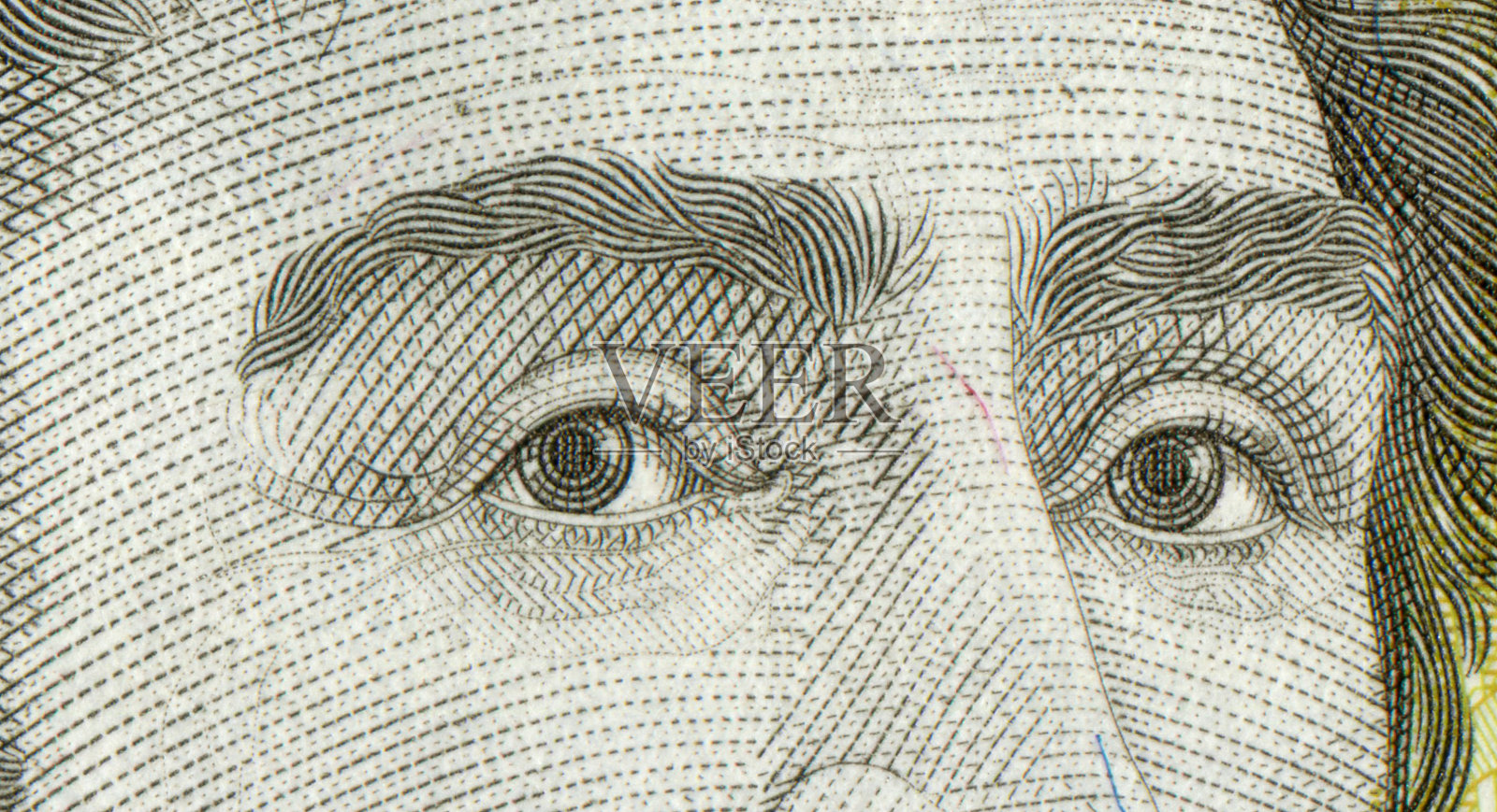 纸币上的面部特征图案设计照片摄影图片