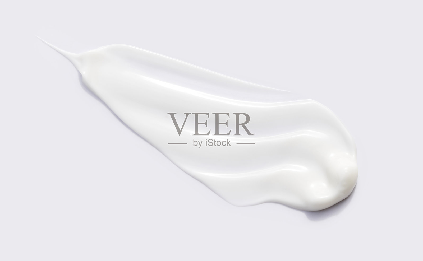 乳霜质地乳液在浅色背景上的特写照片摄影图片